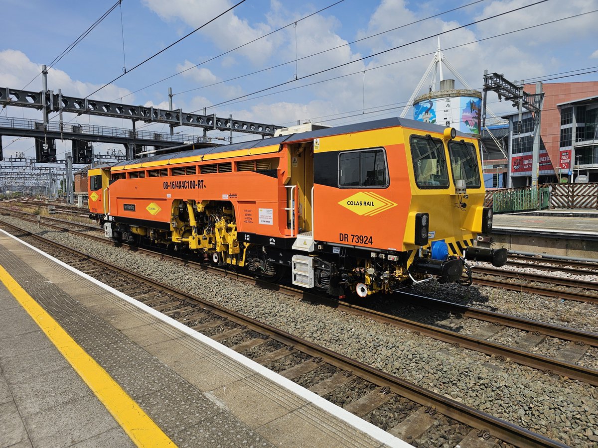 Harrod15S's tweet photo. #Colas Tamper DR73924 passing through #Cardiff Central Station 23/7/26 #trains #trackmaintenance #Networkrail https://t.co/F7PkeyCZ8E