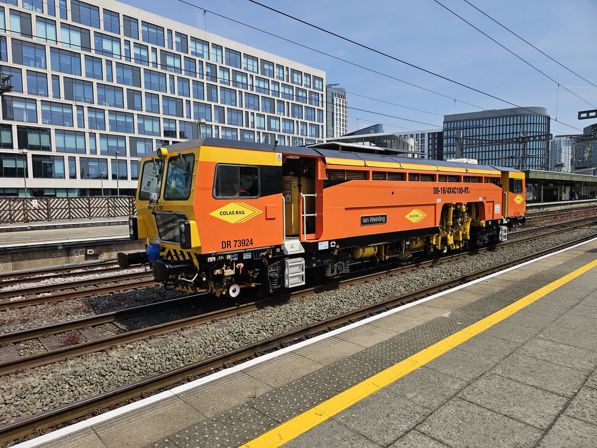 Harrod15S's tweet photo. #Colas Tamper DR73924 passing through #Cardiff Central Station 23/7/26 #trains #trackmaintenance #Networkrail https://t.co/F7PkeyCZ8E