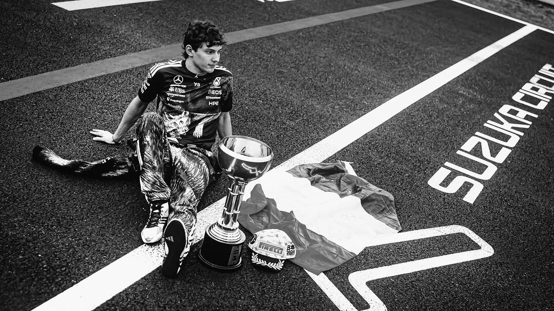 kimiforwdc's tweet photo. the day kimi became the youngest championship leader in f1 history. suzuka kimi, you will always be iconic!🖤 https://t.co/kzhCNFuHGI
