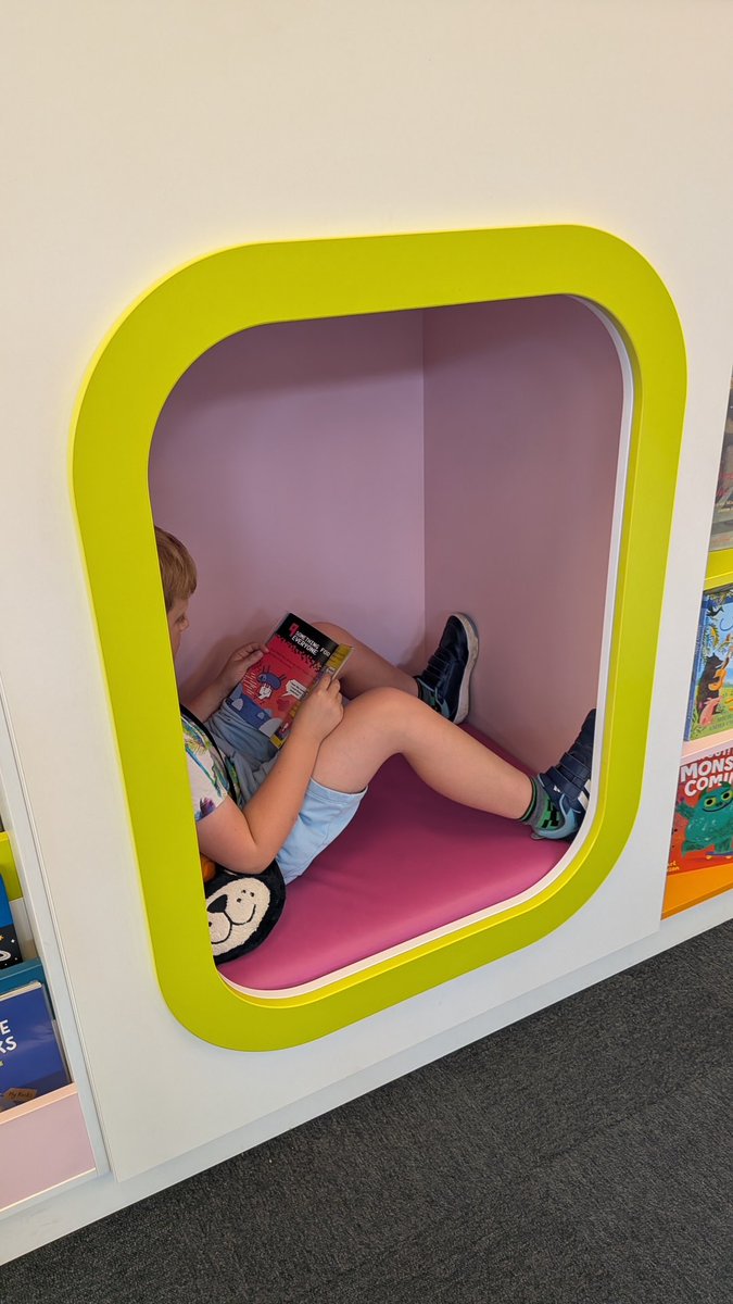 ApRoPrimary's tweet photo. Brandon from year 3 is settled in his local library, enjoying taking part in the #SummerReadingChallenge 
What are you reading this Summer?
#RoebuckReads 📚 https://t.co/wM8aR7p5in