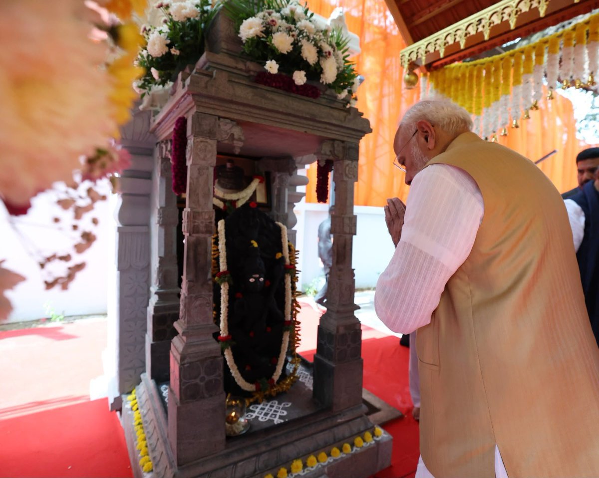 BJP4India's tweet photo. At the Viveka Smaraka complex in Mysuru, PM Modi offered prayers at the Shiva Temple and visited the place where Swami Vivekananda stayed during his visit to Mysuru in 1892.

Glimpses. 🔽 https://t.co/RsPMVBhiXe