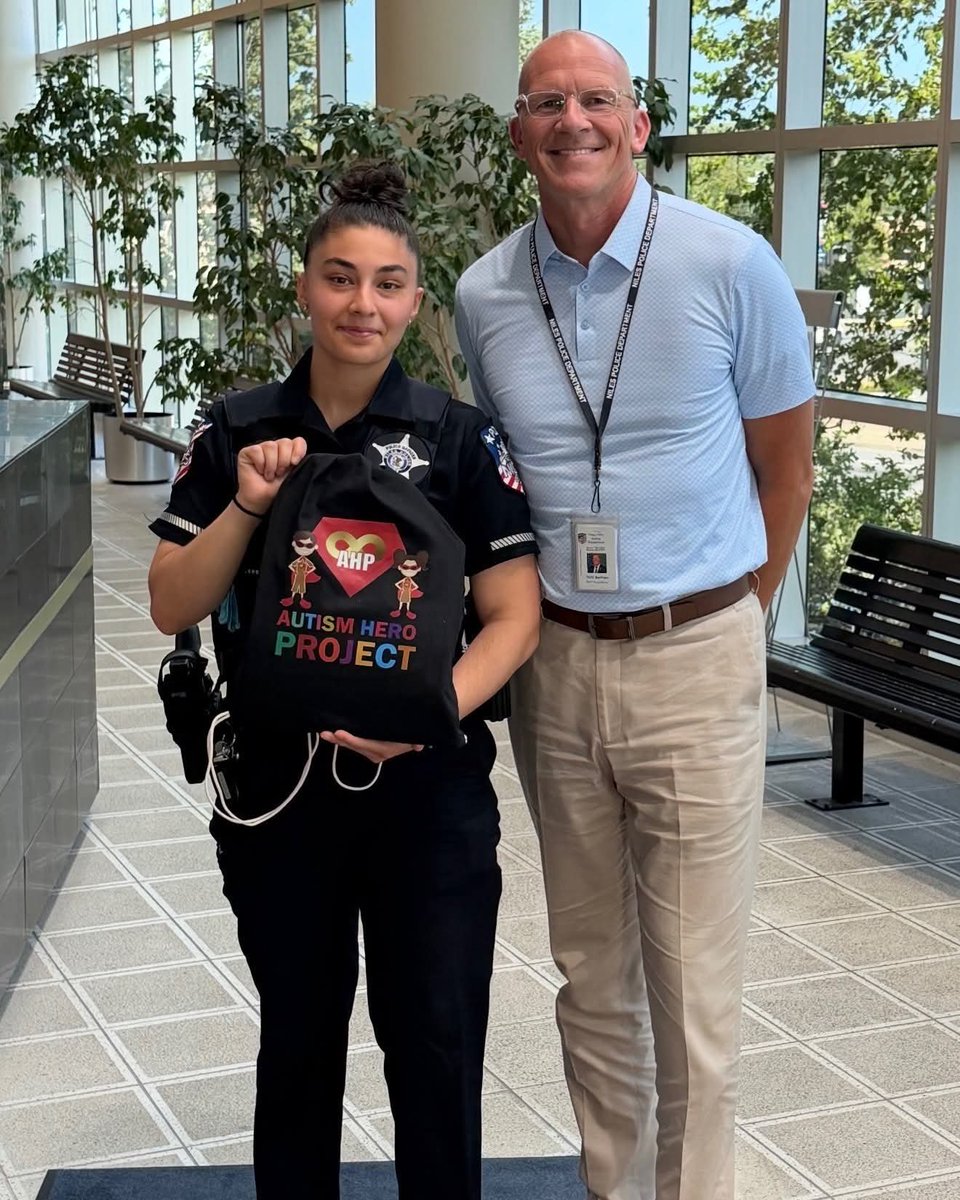 WolfofX's tweet photo. A call came into the Niles Police Department about a suspicious person walking alone along the roadside. When Officer Jessica Zia arrived, she didn't find a criminal. She found a 25 year old non speaking autistic man who had wandered more than six miles from his group home in Chicago on one of the hottest days of the year.

He couldn't tell officers who he was or where he belonged. Rather than rushing the situation, Officer Zia walked back to her patrol car and took out a newly issued autism sensory kit. Inside were fidget toys and calming sensory items designed to help autistic people feel safe during stressful encounters.

She sat with him for nearly an hour, letting him explore the items at his own pace. There were no raised voices, no unnecessary force, just patience. Little by little, trust replaced fear, and the situation that could have ended very differently became calm and manageable.

The officers were eventually able to identify him and reunite him with his caregivers after taking him to a hospital for evaluation. The encounter also became the first real world demonstration of the department's new autism response program, which had equipped every patrol vehicle with sensory kits only weeks earlier.

Looking back on the moment, Officer Zia summed up her role in one simple sentence.

"My job is to help."

On that day, the most important thing she carried wasn't a badge or a pair of handcuffs. It was the understanding that every person deserves to be met in the way they need most.