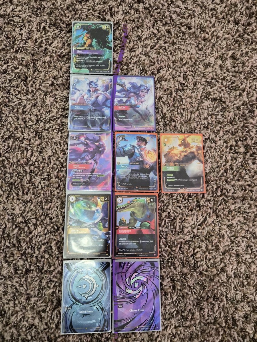 TheOvershow21's tweet photo. So really interesting unboxing for me this morning I ripped 2 boxes from 2 different cases and they were maybe 4-5 cards difference kinda insane. I drew a line to tell which box was which. Interesting how i got an extra alt in the box with no ON🤔 
#vendetta #riftbound https://t.co/f8Nn6hgi8F