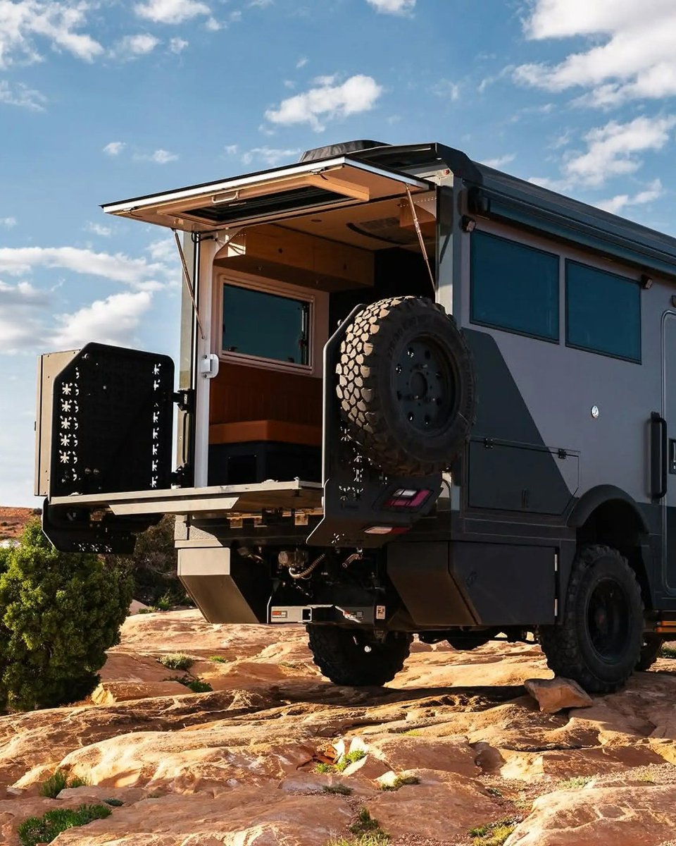 themanualguide's tweet photo. Most campers give you a view through a window. This one gives you an entire back porch. Storyteller Overland's new GXV WILD transforms its rear wall into a fold-down deck, creating the perfect spot to enjoy your… #Overlanding #AdventureTruck #OffGrid #Camping #TruckCamper https://t.co/lX31YUhQvx