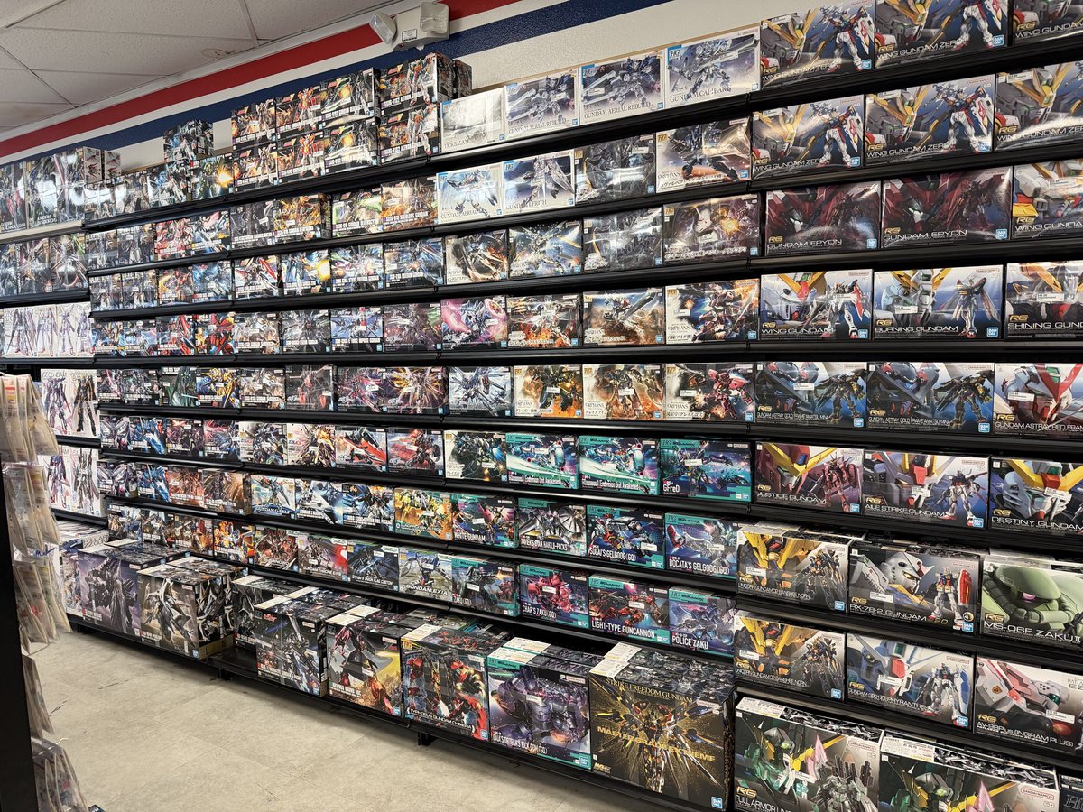 Gunplatime's tweet photo. The local hobby shop switched up their Gunpla display https://t.co/TWMjPEqLwk