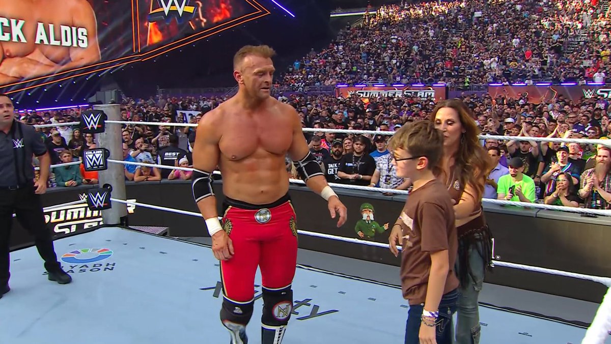 TribalMegastar's tweet photo. Nick Aldis absolutely delivered tonight against GUNTHER.

The SummerSlam crowd gives him a standing ovation and his family joins him in the ring.

What a moment ❤️

#SummerSlam https://t.co/Lg8ZZbtOu2