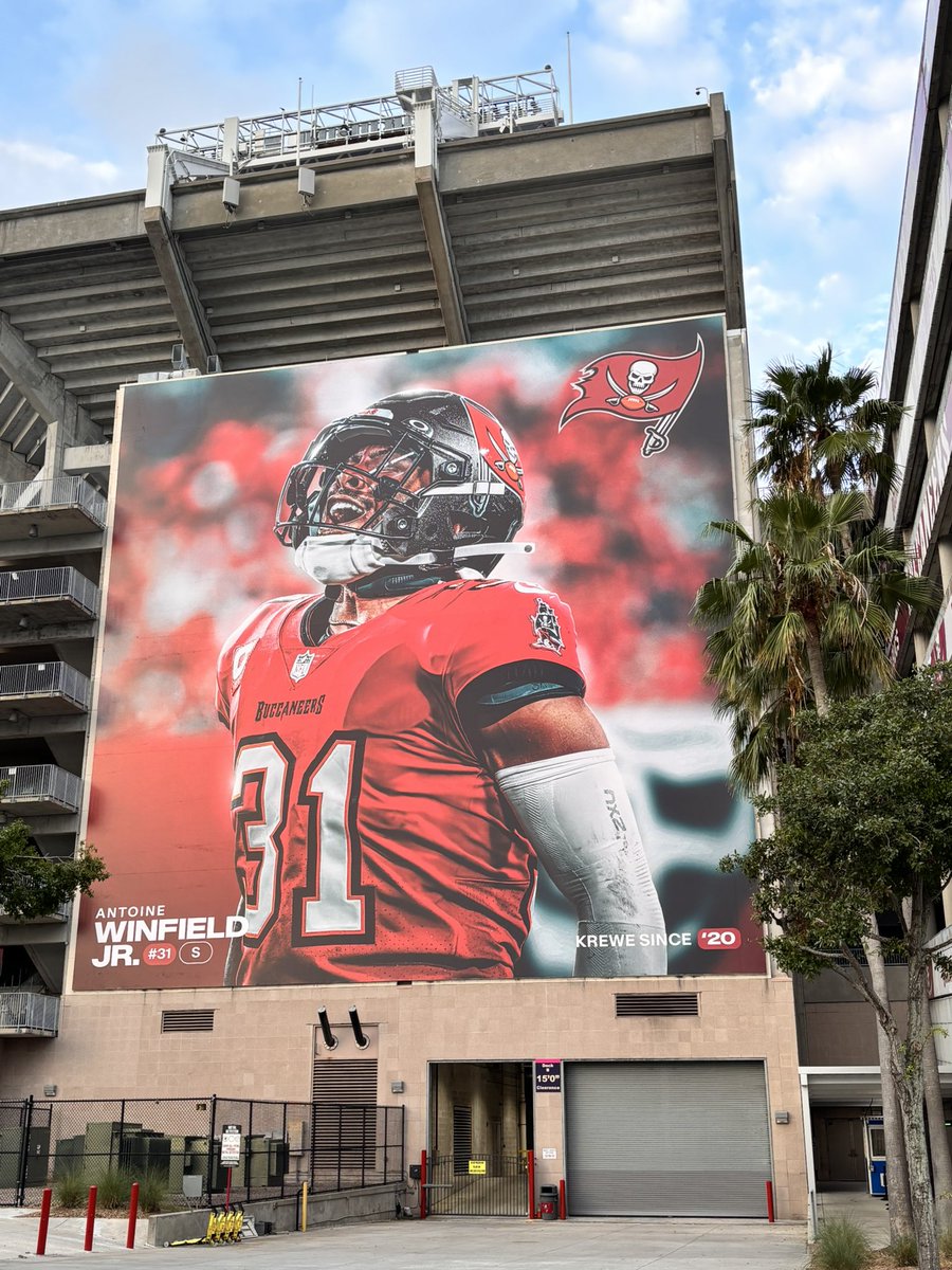 gregauman's tweet photo. There it is: Fourth and final player mural at Raymond James is … Vita Vea on the southeast corner. Godwin, Mayfield, Winfield, Vea. A little more drama on the corners than most years. https://t.co/KJvwG7yo93