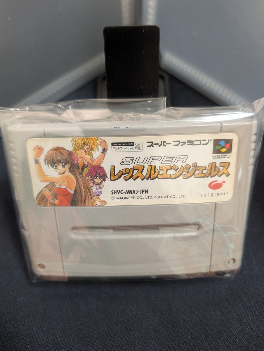 G_Ben76's tweet photo. ❏❏購入品❏❏

　◈　 スーパーレッスルエンジェルス

〘種類〙　SFCソフト
〘価格〙　￥2000
〘購日〙　2026/07/28

SFCソフト集め出した割と早い時期から欲しかったやつですが何か妙に高値だったり箱説付きやったり…近場の店舗に綺麗な箱説一万弱を買おうか迷ってたんですが…これで解決！ https://t.co/0xWLzEkIAV