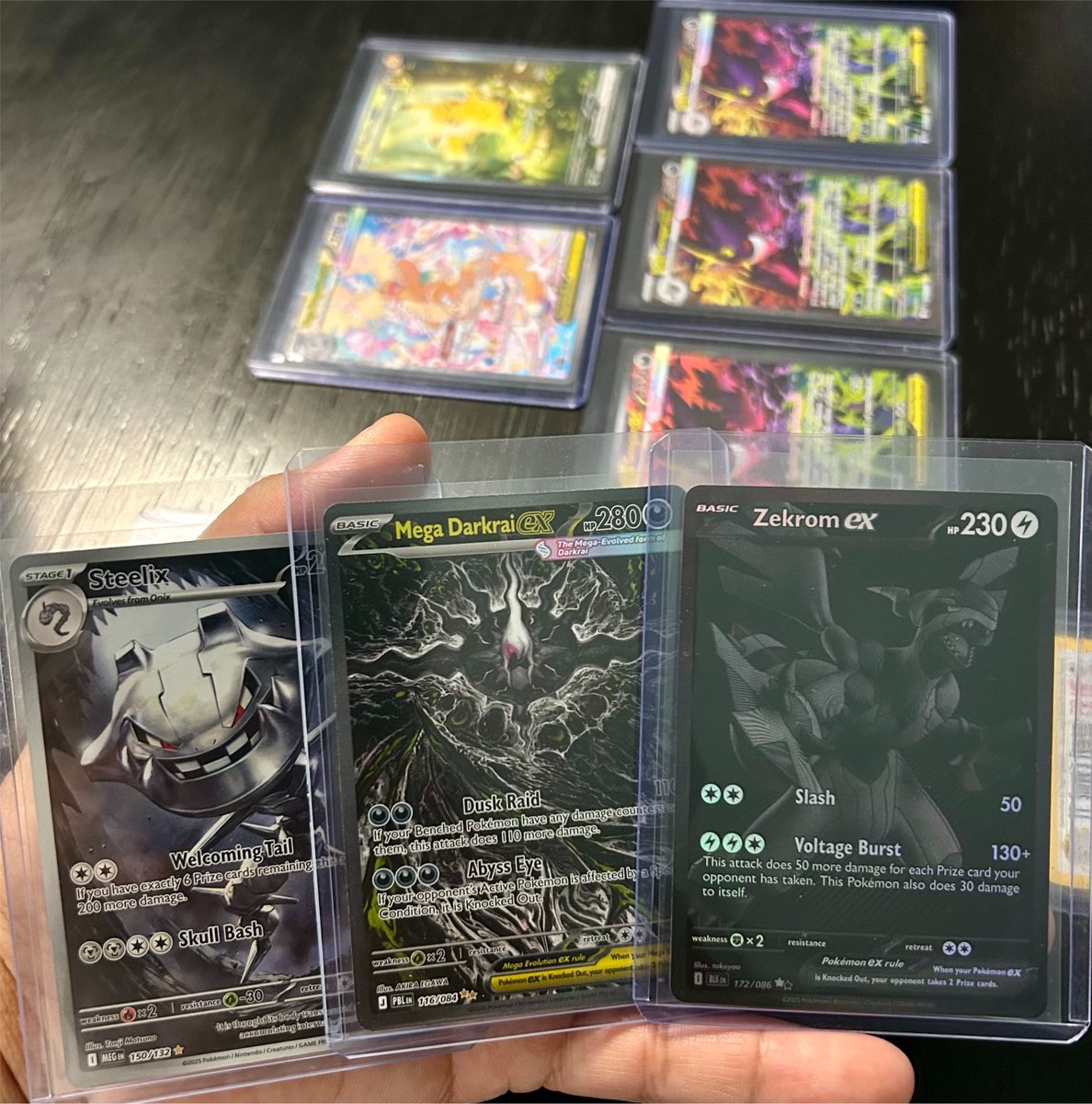 AbisaiR67517011's tweet photo. Have you seen a blacked out binder page? I am working on one. Finally aquired the Zekrom today at a card show. https://t.co/e8TvtFeubJ