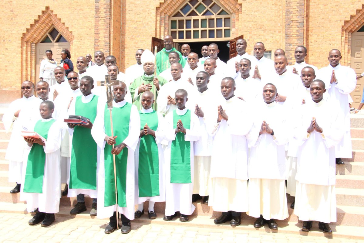 KabaleDiocese66's tweet photo. Earlier today, 20 Seminarians were installed as Lectors and Acolytes while two Seminarians were welcomed and admitted as candidates for Major Orders.

The lectors and Acolytes will be posted in different parishes across the Diocese for their pastoral spiritual year. While those admitted as candidates for Major porder will be ordained Deacons next year (God willing).

We thank Bishop Callist Rubaramira for predicting over this function and pray for the candidates to be led by the Spirit of God in their ministry.

A Lector is entrusted with proclaiming the Word of God during the liturgy and his main roles include: Proclaiming the Scripture readings at Mass (except the Gospel), Leading the Prayer of the Faithful when there is no Deacon, Directing the singing and participation of the faithful when necessary, Preparing other readers for the liturgy, Helping promote a deeper love and understanding of Sacred Scripture among the faithful. A lector is called to proclaim God's Word with faith, reverence, and clarity, recognizing that the Scriptures are living and active.

An Acolyte is instituted to assist the priest and deacon, especially during the celebration of the Eucharist and his responsibilities include: Assisting at the altar during Mass, Preparing the altar and sacred vessels, Serving as an Extraordinary Minister of Holy Communion when needed, Purifying sacred vessels where permitted by Church norms, Exposing the Blessed Sacrament for adoration (without giving Benediction, unless otherwise authorized), Coordinating and training altar servers, Fostering reverence and devotion to the Holy Eucharist. The ministry of acolyte emphasizes service at the altar and a profound love for Christ present in the Eucharist.

Both ministries are not merely functional roles but are ministries of service to the Church. Lectors serve Christ present in His Word while Acolytes serve Christ present in the Eucharist.
