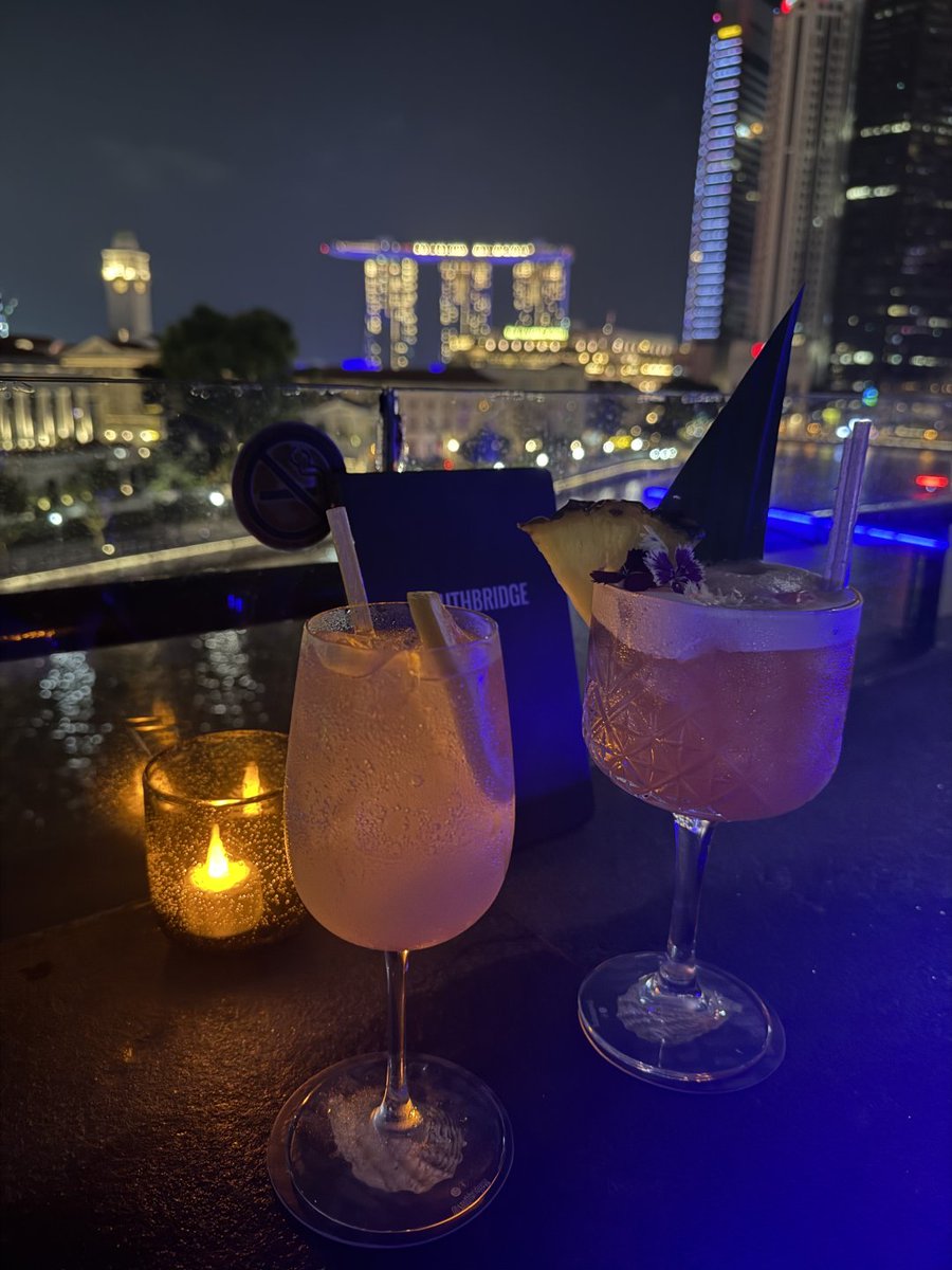 Natsuriito's tweet photo. at the peak of this city raising a glass to the beauty of this moment and place https://t.co/XcdHpbJ8DO