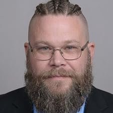 laughlinauthor's tweet photo. @zulu1kilo4 Dude...

AI literally generated a picture of me. 

That's unreal. 

This is literally me. https://t.co/0NwNlp1hhj
