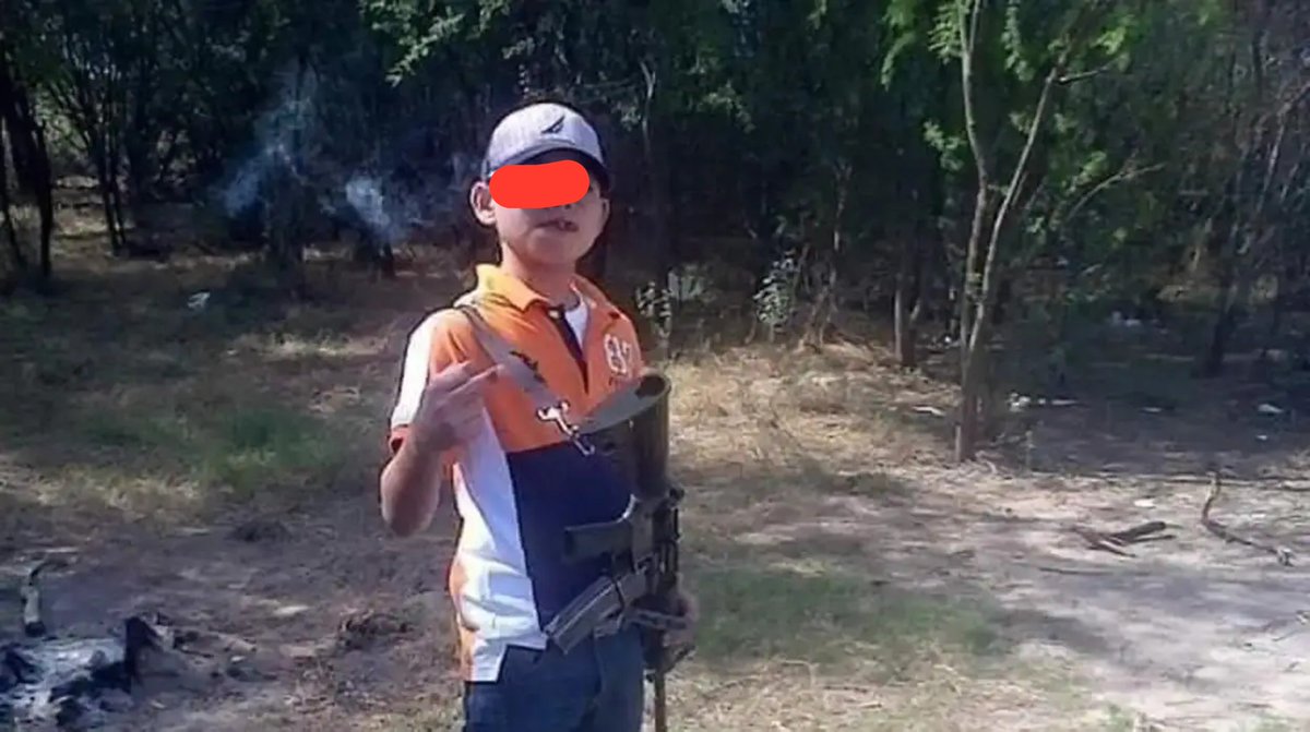 Baaneed's tweet photo. Juanito Pistolas: The Child Hitman Who Was neutralized beyond facial recognition by Bullets in a Clash with Mexican Police Forces https://t.co/QnbC8FWV4l