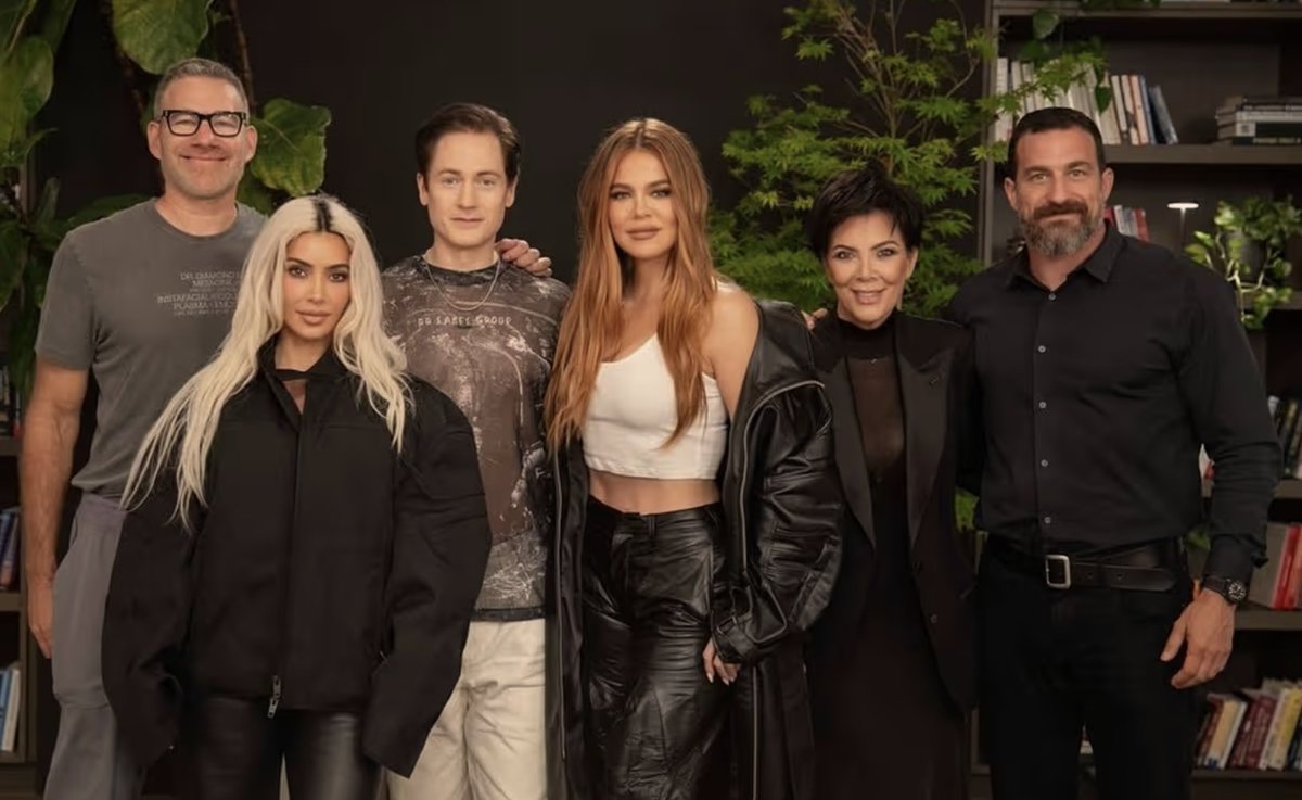 SamaHoole's tweet photo. Sixteen months after this photograph was taken, the woman second from the left put money into a sixty million dollar round for the host's longevity company. He had described the dinner, at the time, as forming organically among friends of friends.

June 2024, at Bryan Johnson's house. Kim Kardashian, Khloé Kardashian, Kris Jenner, a podcast host and a plastic surgeon. A dinner about not dying, with a plastic surgeon at the table. He filmed it and posted it himself.

October 2025, the money lands. Sixty million from Kim Kardashian, Naval Ravikant, Alex Hormozi, Ari Emanuel and the Winklevoss twins. A chief executive is hired.

Now read his record as what it is, which is a recall notice.

A litre of his seventeen year old son's plasma, run into his own arm in front of the world's press. No benefit found. Withdrawn.

Growth hormone to regrow his thymus. Pressure inside the skull rising, blood sugar climbing. Withdrawn.

Five years of rapamycin, which he called the most aggressive protocol in the industry. Judged in 2024 to be doing him net harm. Withdrawn.

Over a hundred supplements a day, now around thirty. Seventy products, gone without a statement.

Every one of those was announced as the answer before it was tested as a question. That is the part to hold onto. He did not run these quietly and report back. He filmed them, branded them, sold the protocol by subscription, and let an audience of strangers copy a man who was still finding out. The correction always arrived after the purchase.

And each retraction was cheap, because it cost him nothing but pride. He has now sold that too.

Blueprint is a subscription, a meal delivery arm, a merch line and an app. Kim Kardashian did not wire in sixty million to be told next spring that the powder does not work.

A man can change his mind. A stack has a subscriber base.

He was diagnosed in July with autoimmune gastritis, an incurable condition in which the immune system dismantles the acid-producing cells of the stomach. My stomach is eating itself, he wrote. He attributed it to how he ate before the protocol, and to the stress of being a father of three.

Every failed intervention was the intervention's fault. The one failure inside his own body was his childhood diet's fault, and his children's. Five years, two million a year, thirty doctors, and the protocol has never once been on trial.

He is not the man who ran the experiment so you would not have to.

He is the man who sold the results before they came in.