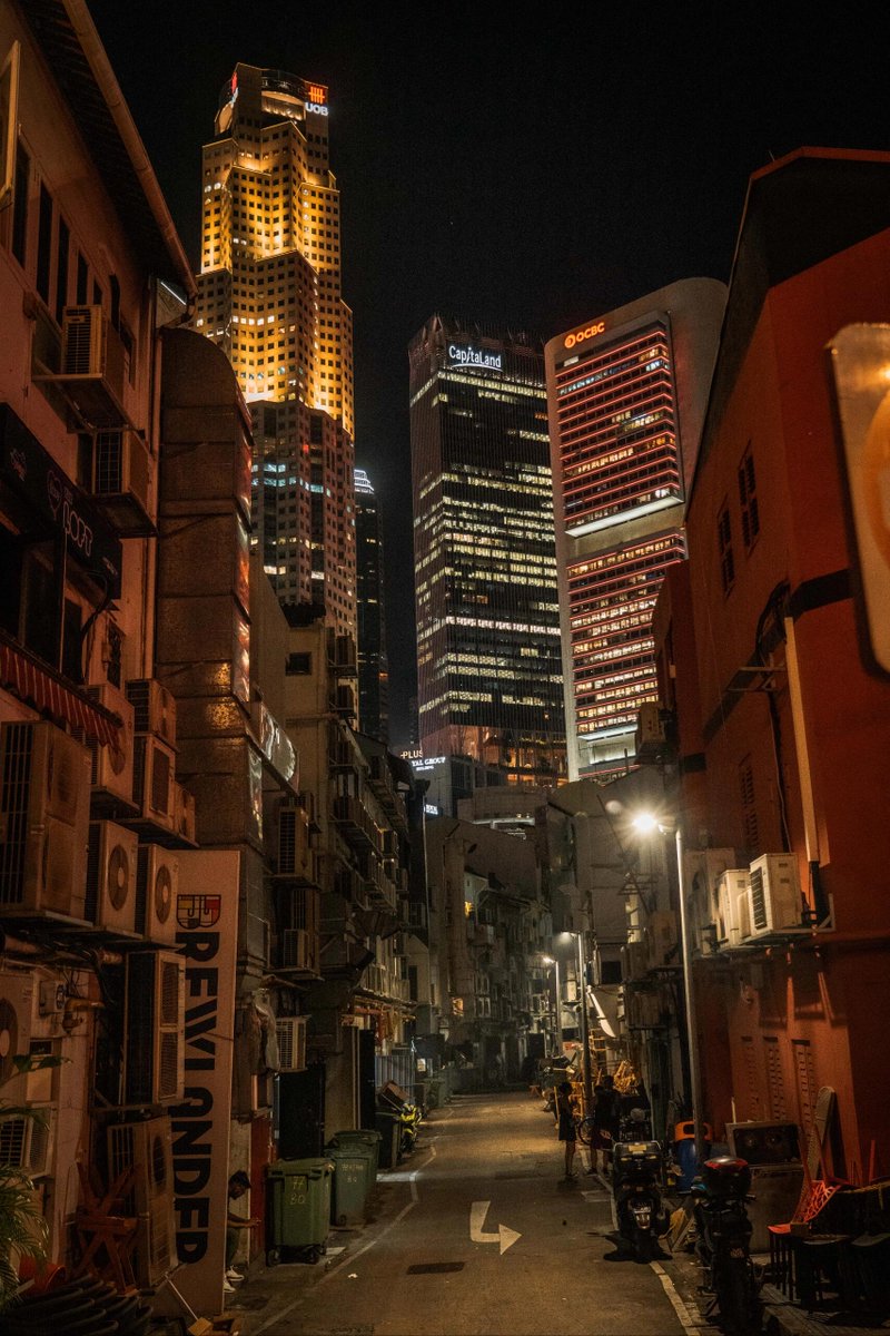 EmaandCdsfkoco's tweet photo. Singapore nights sparkle with neon reflections—captured by a lone photographer, admired by monks, felt by couples strolling, and echoed in quiet backstreets. ✨🌃 https://t.co/XyGoKnlOTu