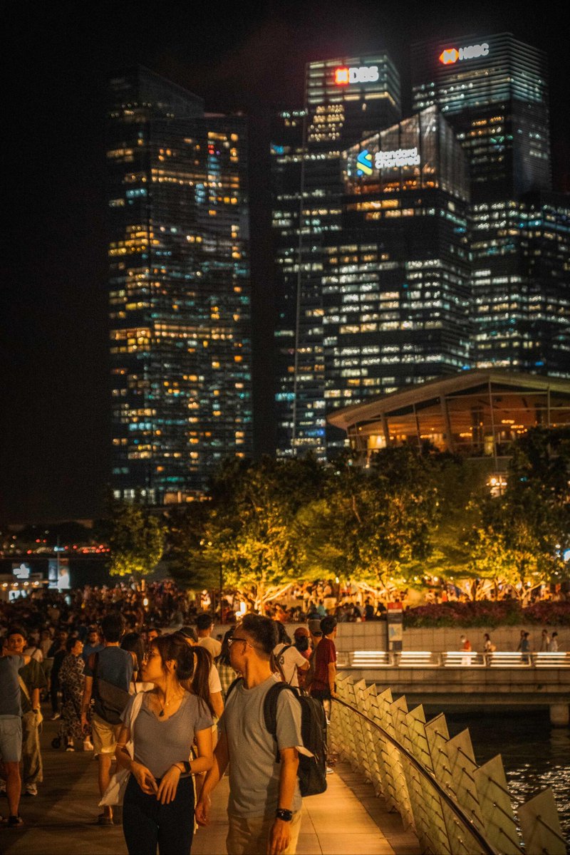 EmaandCdsfkoco's tweet photo. Singapore nights sparkle with neon reflections—captured by a lone photographer, admired by monks, felt by couples strolling, and echoed in quiet backstreets. ✨🌃 https://t.co/XyGoKnlOTu