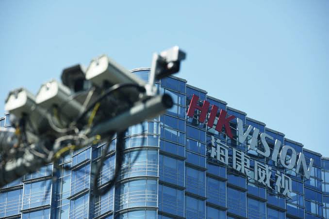 Nabla_Arc's tweet photo. Hikvision 海康威视 (https://t.co/bFn9B6rGgd)

On July 22, the FCC closed the last door: not only Hikvision devices barred from the US, but any device anywhere containing a Hikvision component capable of processing logic, with no transition period. This followed an outright import ban in June. For a company blacklisted in some form since 2019, the striking point is how little either announcement changed the numbers.

That frames everything below. Hikvision’s external ceiling is fixed by forces it cannot negotiate with, so the story has moved inside the company.

Fundamentals: growth without growth

The 2025 result looks like a typo. Revenue ¥92.5B, up 0.01%. Net profit ¥14.2B, up 18.5%, the best in five years. Profit rising while sales stand still is rare in manufacturing and was deliberate: management shifted focus from revenue scale to earnings quality.

Execution has been consistent. Gross margin climbed six straight quarters: 43.83% in 2024, 45.88% in 2025, 49.09% in Q1’26, the highest since 2020. H1’26 revenue reached ¥46.8B (+12.0%) and net profit ¥7.9B (+39.6%), with recurring profit up 40.5%. 2025 ROE hit 17.3%; operating cash flow was ¥25.3B, up 91%.

Two numbers complicate it. Inventory rose 19.1% in a quarter to ¥24.4B, attributed to stockpiling against component price inflation—defensible but capital-consuming. More importantly, H1 operating cash flow fell 39.5% to ¥3.2B even as profit surged 40%. Last year’s cash generation was the best evidence the quality turnaround was real; this year’s is the evidence against it.

The innovation engine

If the core market is capped, growth must come from elsewhere. Eight innovation businesses generated ¥25.4B in 2025, up 13.2%, now 27.5% of revenue: robotics ¥6.45B (+8.8%), Ezviz smart home ¥5.68B (+9.5%), thermal imaging ¥4.44B (+6.0%), storage ¥2.38B (+2.9%), other units ¥1.20B (+27.5%). Seven of the eight are profitable.

A real but partial answer. Most grow at high single digits—faster than the parent, slower than a re-rating requires. Ezviz is listed on the STAR Market; Hikrobot’s ChiNext application has sat in the queue since March 2023, delaying the value crystallization the market has waited on.

Geopolitical reality

The blacklist history is long: Commerce Entity List in 2019, Pentagon CCMC list in 2020, FCC Covered List in 2022, five Xinjiang subsidiaries in 2023, Hikmicro in 2024, then this summer’s import ban and component rule.

The counterintuitive consequence: North America is already effectively zero, so each new restriction removes less than the last. What matters is the composition of what remains. In Q1, developing markets clearly outpaced developed ones, with Latin America, the Middle East and Africa, and Asia-Pacific strong while Europe slowed under oil-driven pressure. Management pre-stocked ahead of Middle East disruption and called that decision vindicated. Its framing: where there is destruction, there is rebuilding.

Hikvision is no longer a global company constrained by US policy. It is a company built for the markets US policy does not reach.

Outlook

At ¥35.49 on July 24, market cap is ¥325B, about 23x 2025 earnings, with ¥10.5B of 2025 dividends implying roughly 3.2% yield. R&D ran ¥11.8B (12.7% of revenue) and ¥59.5B over six years, with nearly half of employees in R&D or technical service.

Bull case: margins still climbing, innovation nearing 30% of revenue, an expanding AI model line across cloud, edge and device, a modest multiple with real cash returns.

Bear case is arithmetic. With revenue flat, margin expansion does all the work, and that road has a finite length. Government demand stays fiscally constrained. The geopolitical ceiling is permanent, not cyclical.

Leaner company or stalled one? Forty percent profit growth argues the first. Cash flow down 40% argues for caution. Only a reacceleration in revenue settles it.

#AIoT #ChinaTech