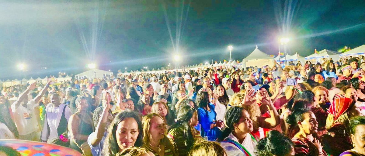hawelti's tweet photo. #52ndEritreanFestival in the US (2026) held in Dallas, Texas, from July 31 - August 2 on the weekend under the theme:  "Our Resilience: Our Guarantee!" 

Festival graced by the presence of Mr. Yosuf Saiqh, Head of PFDJ Organizational Affairs.  Opening speech by Mr. Berhane Ghebrehiwot, Charge d 'Affairs at the Eritrean Embassy in the US. 

Rich variety of programmes in Festival (2026), which was attended by tens of thousands of Eritrean residents in the US, included: cultural and artistic shows; research-based presentation of Eritrea's archeological heritage; lectures/panel discussions on relevant themes by professionals in the respective fields; exhibitions on business entities owned by Eritrean entrepreneurs; seminars on current issues; books forum; as well as presentations on women's struggle for gender equity... etc.