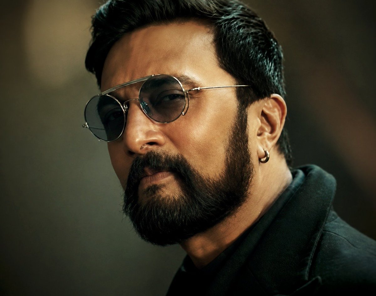 KicchaUniverse's tweet photo. The aura speaks before the words do. 🔥

A new chapter. A new throne.
#BBK13 is ready for a grand beginning. 👑✨

@KicchaSudeep

#BiggBossKannada #KicchaSudeep  #BossIsBack #Entertainment #KicchaUniverse https://t.co/nqGgikjTMU