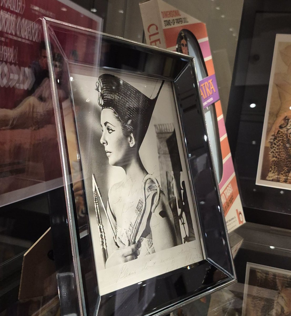 ImmortalEgypt's tweet photo. 🤩The legendary Liz playing the legendary Cleopatra, this signed photo so generously loaned by @EgyptomaniaMuse one of the key pieces in our #Cleoandthequeens exhibition @BarnsleyMuseums https://t.co/H2z6ULbA6C