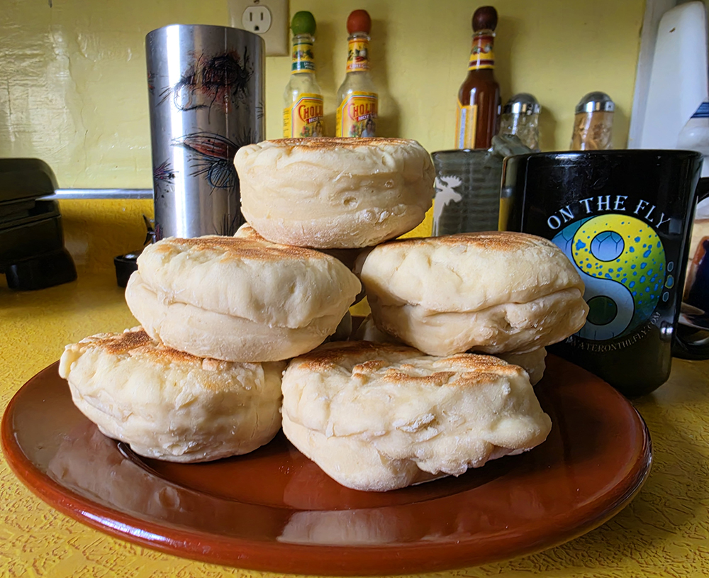 Saltwateronfly's tweet photo. Coffee's not ready. Fish aren't moving yet. This is the window.

Great Aunt Carol's sourdough English muffins — mixed the day before, after rising, resting in the cooler while you sleep, griddled streamside while you re-tie tippet. No oven. No proof box. Just time and a warm skillet.

Full recipe (and how to keep your starter alive on the road) : https://t.co/ro8D9wXVQg

🎣🍞 #FlyFishing #CampCooking #Sourdough #GetLostInAmerica