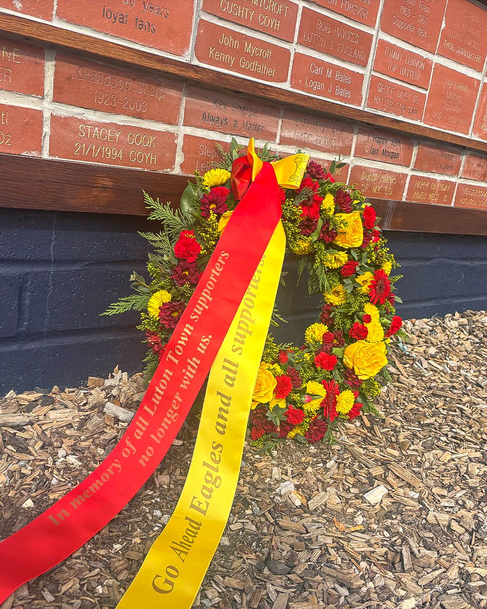 LutonTown's tweet photo. A huge thank you to @GAEagles for the lovely gesture left by our memorial wall today following the game 🧡 https://t.co/dMXYipWXYM
