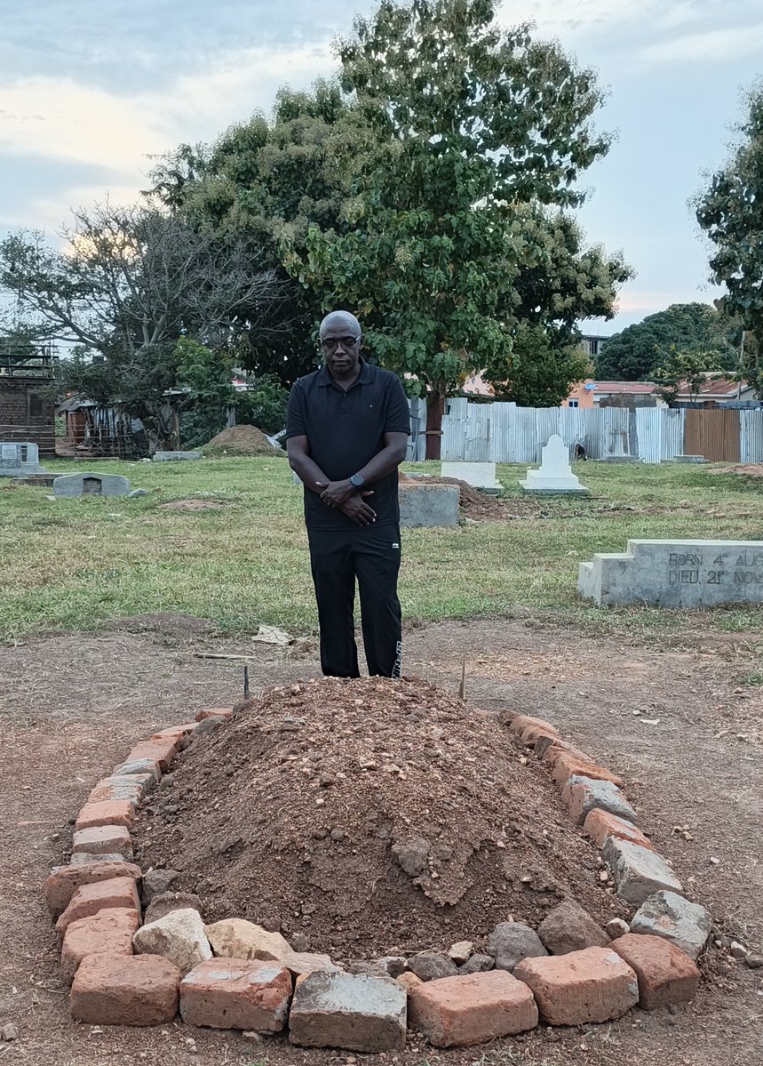 j_mucunguzi's tweet photo. I paid my respects at the simple grave of my friend, elder and leader, Mzee Gen (retired) Moses Ali at Abirichaku Takuwa Mosque in Adjumani, bringing closure to the fact that the once giant general was completely gone and olonger with us.

I had known General Moses Ali for 26 years, having first met him in 2000, after he summoned me to his office at Farmers House, where he sat as Minister of Trade, Tourism and Antiquities. 

As a young journalist, fresh from Makerere University, I had written a story about him which he protested because I had not addressed him with his full military rank.

He jokingly said I had written about another Moses Ali not him, because according to him, while I had addressed him as Brigadier Moses Ali, for him,he reffered to himself as General Moses Ali, though at that time, was still demanding for the rank of full General. 

He sat me down a lectured me about ranks in the army, and why they take it personally if you misrepresent them. 

Thereafter, he went on into the gist of the story about tourism in Uganda, which he complained the media was reporting  badly. 

When I had entered his office, his size overwhelmed me. He towered up there, as I stood down looking up to him.
 
But after that encounter, we became close and I would in the years that followed write several stories with him as my source. 

The next phase of working with him was even much closer: it was from 2015 to 2022, when I was head of communications and spokesperson at the Office of Prime Minister where he was 1st Deputy Prime Minister.

A stickler to ranks and titles, if anyone referred to him as 1st Deputy Prime Minister, he would protest and say that you are addressing a different person.
 
You had to state that he was: First Deputy Prime Minister and Deputy Leader of Government Business in Parliament,Rt Hon Gen (rtd) Moses Ali, MP. 
General Ali was a towering giant, but he was also a very disciplined man. In all the meetings former Prime Minister @RuhakanaR called, Gen Ali was always the first in the room--waiting. He hated late coming and would rebuke anybody who arrived after the Prime Minister had sat in the Chair. 
Gen Ali was a consumate reader. whenever we delivered meeting documents to him, he would straight away dive into them and never came to meetings unprepared. He would tell you and refer to pages and paragraphs in thick documents, without going back to them. 
One time, he detained a team of technical people from ministries of Water and Environment and Agriculture who had presented a document on irrigation policy-- that he suspected had not been read. It was about 500 pages. 
He asked security to close the door, with him and the officials inside and ordered that the document be read from cover to cover. We sweated, but it paid off. 

And at the end of meetings, Moses Ali always announced that: Departure is in reverse order--the most senior first, and the lowest rank last. 

He was tough and firm, but also very kind and generous.

We miss you.