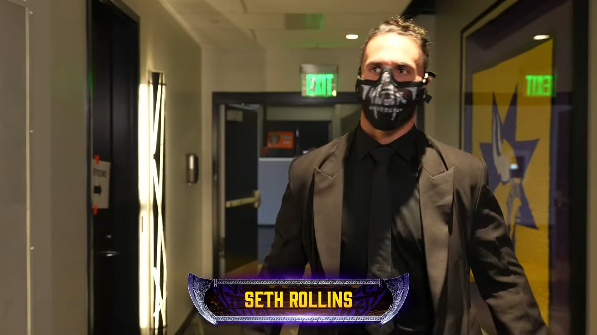 WrestleTalk_TV's tweet photo. Seth Rollins arrives to SummerSlam with an old Shield mask 👀 https://t.co/GRFCDCWxG2