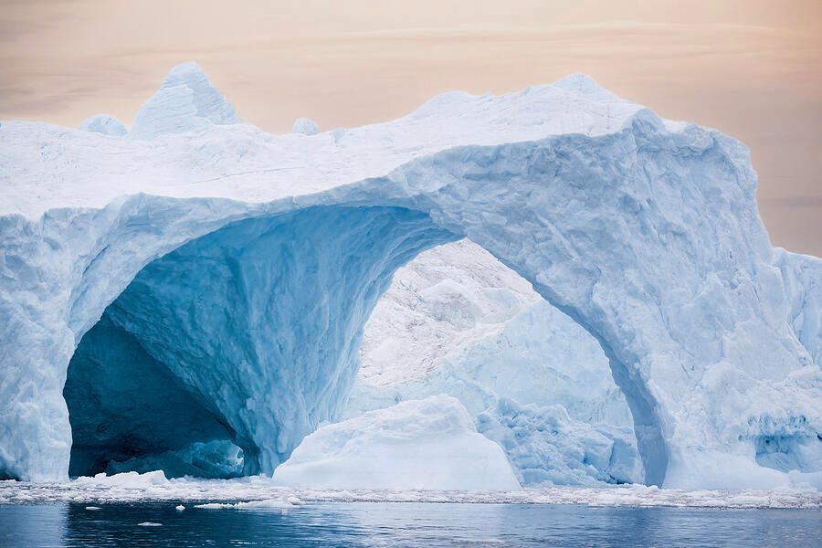 joancarroll's tweet photo. Majestic Greenlandic Ice Arch! https://t.co/3TVZo5sTXY #iceberg #greenland #ilulissat #diskobay #reflections #tunnel #arch #icy #icebergs #arctic #nature #ocean #serene #seascape #landscape #unesco #worldheritage #buyart #wallart #artforsale #artstore #wallartforsale #giftideas @joancarroll