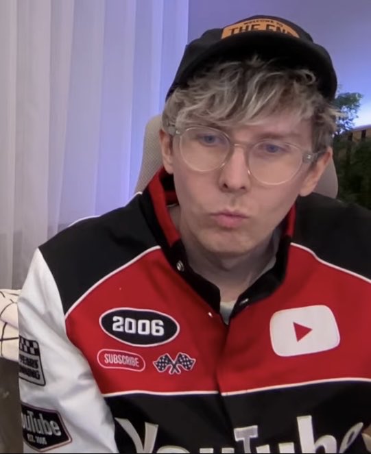 amazinglexa's tweet photo. PHIL LOOKS SO TEA IN HIS YOUTUBE JACKET https://t.co/y8TaUTKB31