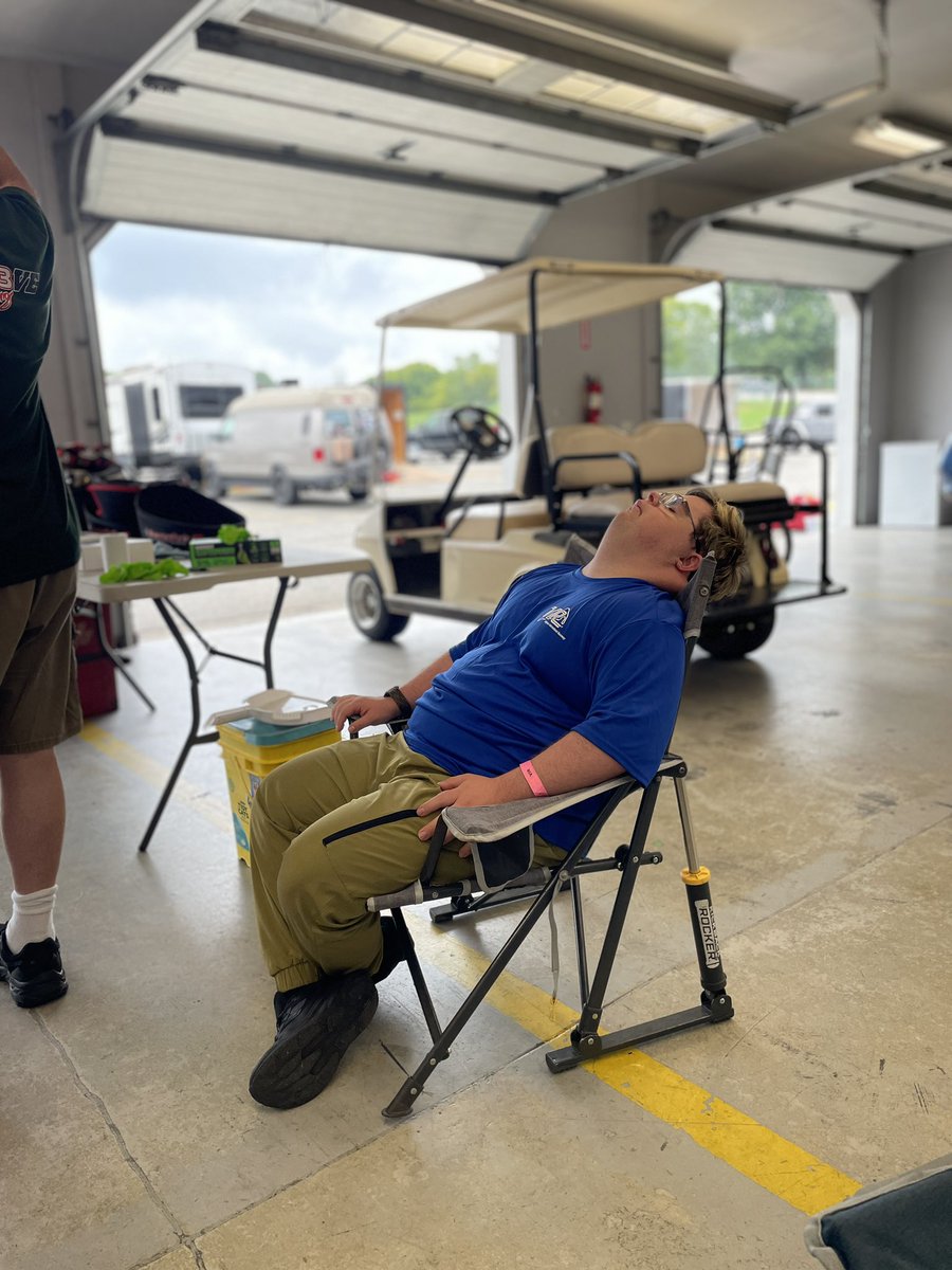 DownsandTowns's tweet photo. Crew chief hard at work in the garage .
These 15-hour races are hard on a fella…
#champcar #VIR https://t.co/C65Sq3Vm56