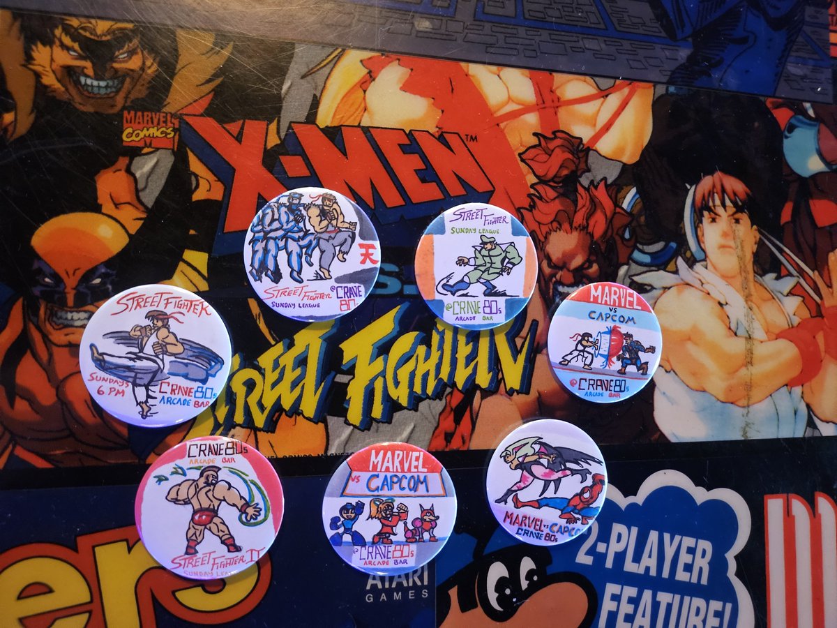 hypertane's tweet photo. bunch of pins i drew for smash bros , street fighter, marvel vs capcom tournaments https://t.co/IcPpdJEvRx
