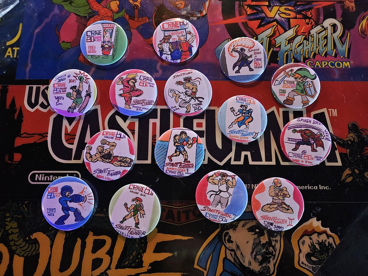 hypertane's tweet photo. bunch of pins i drew for smash bros , street fighter, marvel vs capcom tournaments https://t.co/IcPpdJEvRx