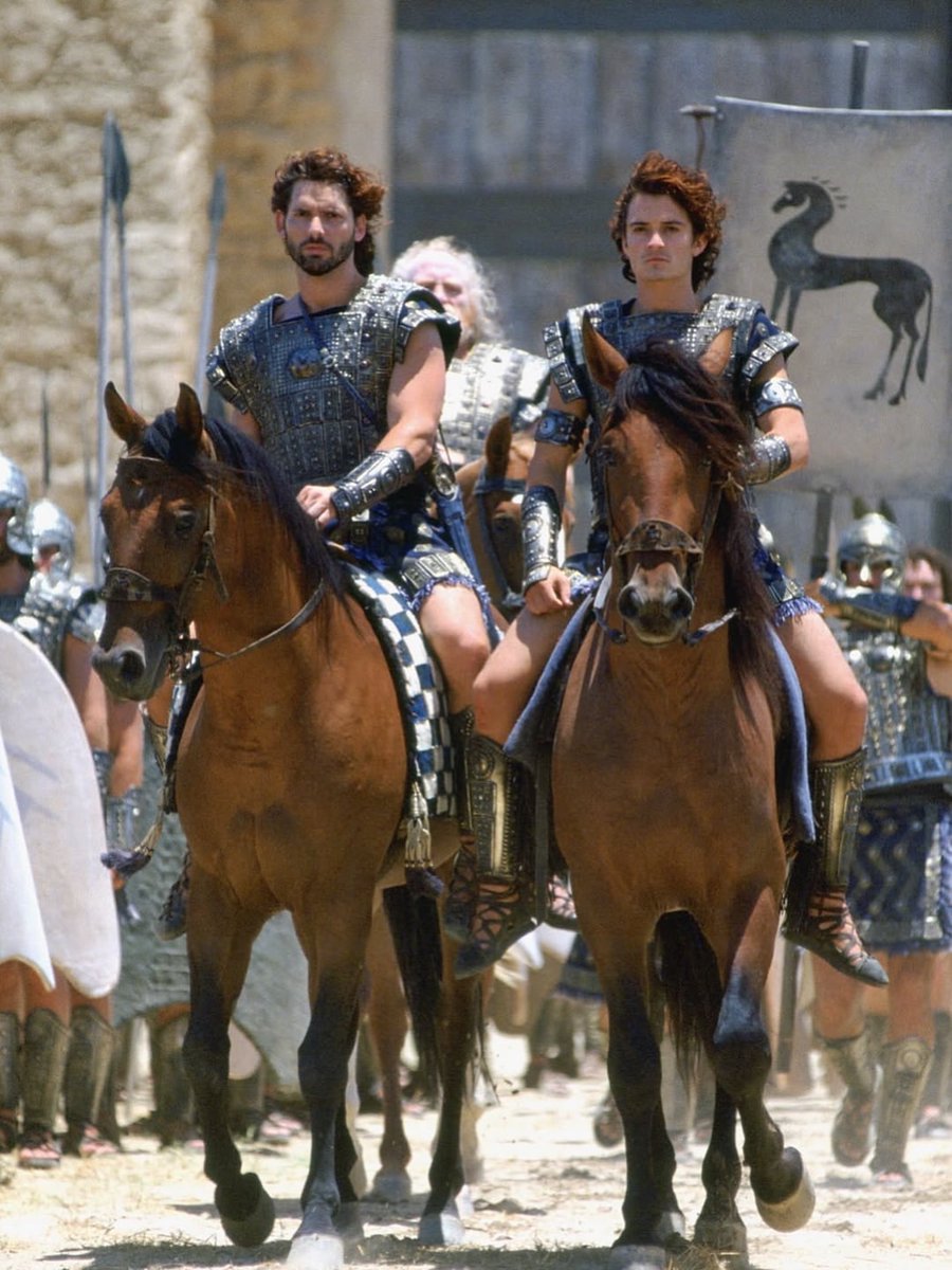 historyinmemes's tweet photo. Long before The Odyssey reached the screen, there was Troy (2004).

Released in 2004, Wolfgang Petersen’s Troy brought the legendary tale of the Trojan War to the big screen on an epic scale. After Trojan prince Paris takes Spartan queen Helen, a massive Greek army sails across the Aegean to lay siege to the fortified city of Troy.

At the heart of the story is the clash between two legendary warriors. Brad Pitt stars as the glory-driven Achilles, while Eric Bana delivers a powerful performance as Hector, the honorable defender of Troy. Filled with grand battle sequences and memorable performances, Troy remains one of the most iconic historical epics of its era.