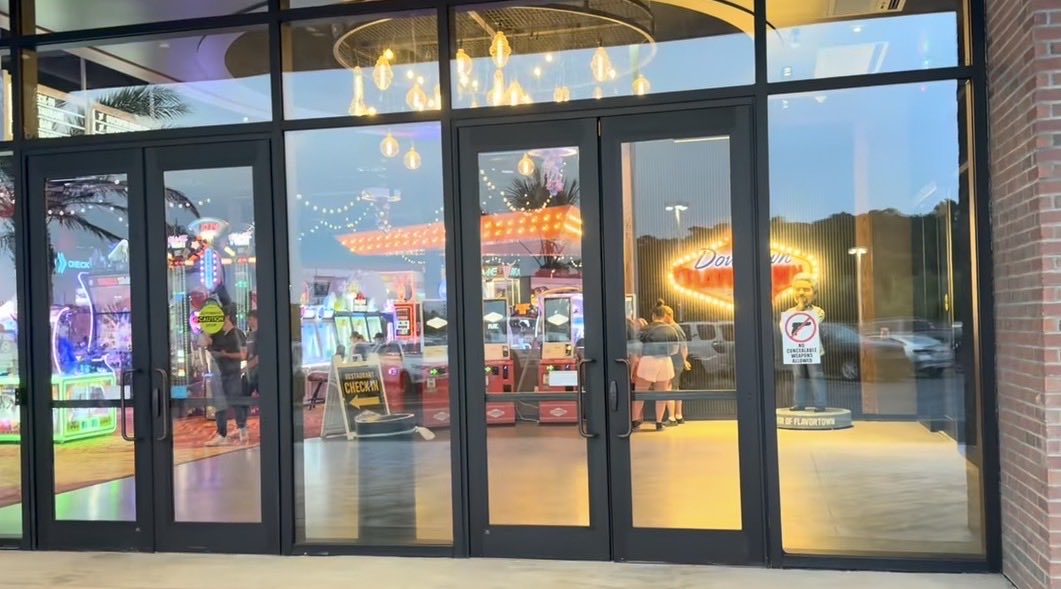 CraigEthington's tweet photo. Excited to see Downtown Flavortown open in Myrtle Beach. But @GuyFieri, I think y’all missed the mark with the No Concealed Weapons signs on the front doors in a Constitutional Carry state like South Carolina. Hope you reconsider this. #downtownflavortown https://t.co/qnQv5PMywW