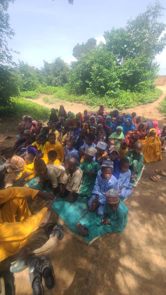hussainimk's tweet photo. Salam my people. Allah SWT has located this children through us. This is an Islamic gathering being conducted under a tree at this age in a village at the outskirts of Zaria. 

We’re embarking on a journey to build to two classes for them. 

 The Prophet Muhammad (ﷺ) said:
 “When a person dies, all their deeds come to an end except three: ongoing charity (Sadaqah Jariyah), beneficial knowledge, or a righteous child who prays for them.”
 (Sahih Muslim)

Kindly donate let’s change their lives 

2255875600
Zenith bank 
Huss: 
D:Islamiya building.
