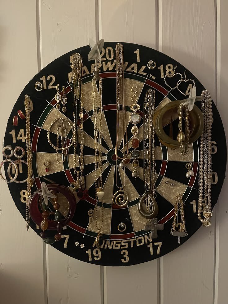 vogueamourr's tweet photo. dart board jewelry hanger https://t.co/1igOruqMBD