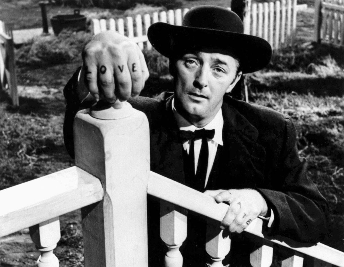 SketchesbyBoze's tweet photo. Watched Night of the Hunter again tonight. The screen can scarcely contain Robert Mitchum's diabolic malevolence. The surrealist influences, in acting, script &amp; cinematography, lend it the air of a dark fairy-tale. Movjes don't get any better. https://t.co/wpaJxdODbm