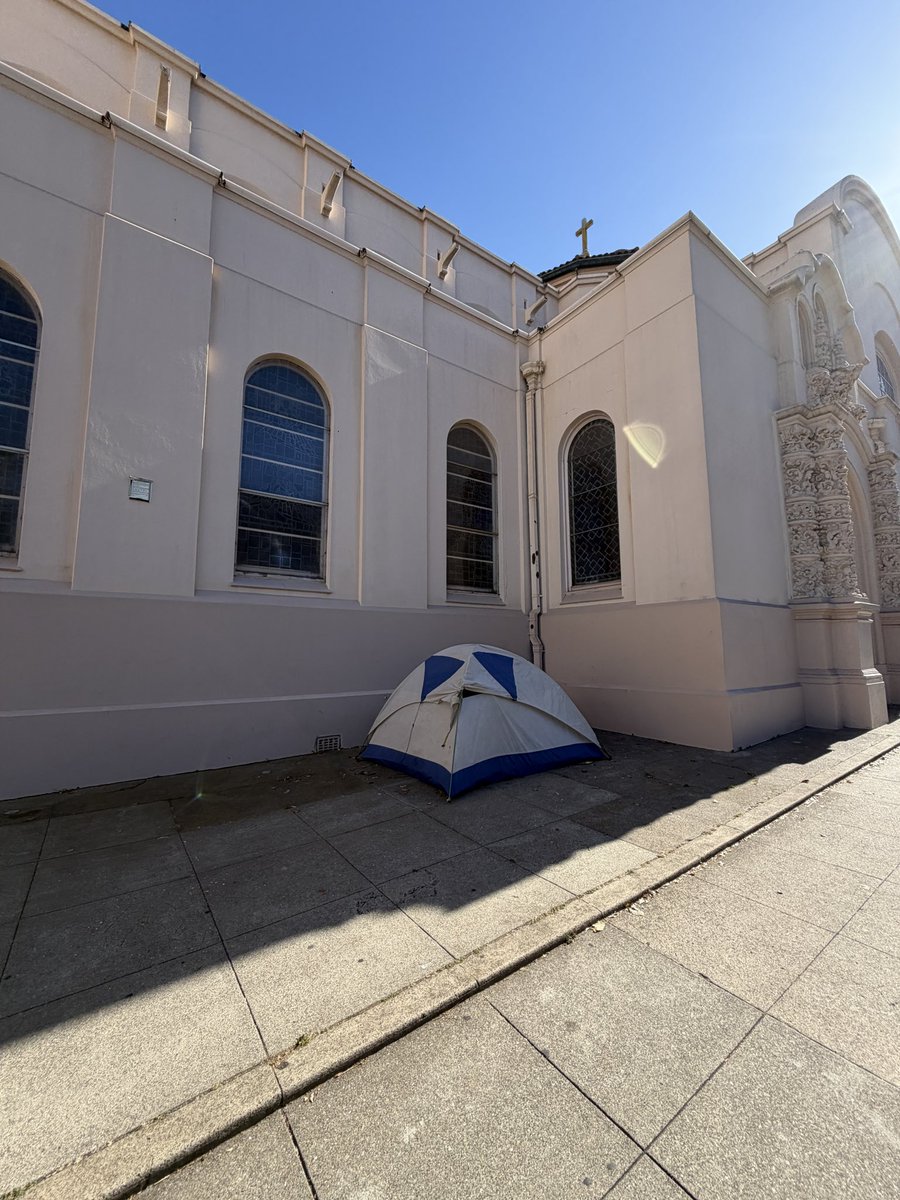 AmberRichmondSF's tweet photo. Today I visited Mission Dolores for a college field trip. I was excited to sit outside afterward and sketch one of San Francisco’s most historic and beautiful landmarks.

Instead, I watched a couple openly smoking drugs on the sidewalk outside the church. A few minutes later they disappeared under a blanket together, and it appeared they were engaging in sexual activity in public. On the opposite side of the church, someone else was camped in a tent.

These weren’t isolated incidents hidden away from view. They were happening at one of California’s oldest and most significant historic sites, where students, families, tourists, and parishioners come to learn, worship, and appreciate history.

As someone who spent years homeless and addicted in San Francisco, this doesn’t make me angry because I don’t understand addiction. It makes me angry because I do understand it. I know what it’s like to have drugs become the only priority. I also know that accepting this as normal isn’t compassionate—for the people trapped in addiction or for the community that has to live with it.

We should be able to preserve places like Mission Dolores without people having to step around encampments, public drug use, or sexual activity on the sidewalk. We can have compassion for people while also expecting our public spaces to be safe, clean, and respected.
