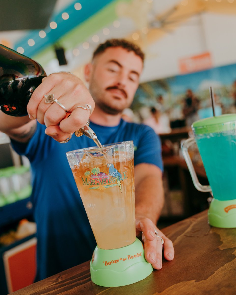 GORaymondJames's tweet photo. It's always five o'clock somewhere at the Wyndham Championship!

@Margaritaville at The Wyndham is a must-stop on your way into the tournament. Enjoy a cheeseburger in paradise and a frozen concoction in our most festive atmosphere with live music! https://t.co/A5mRllw2PN