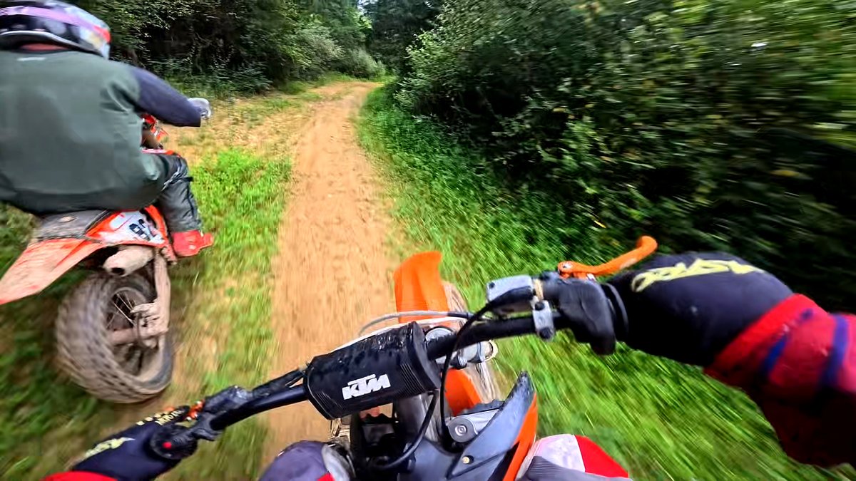 RTiPower's tweet photo. Two bikes can take the same trail and tell completely different stories. The fun part is comparing notes when both riders finally stop grinning. 🧡😄 #WoodsCrew #DirtbikeDays #RideWithFriends https://t.co/prBCt2hd6T