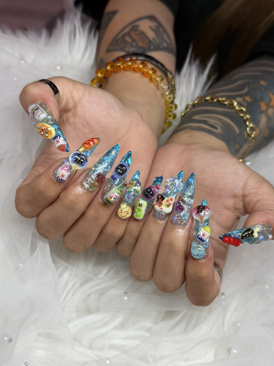 sagihime70's tweet photo. 夏祭りネイル💅

やっぱりロングだと
沢山パーツ付けられて幸せ😚 https://t.co/6MnAne3goP