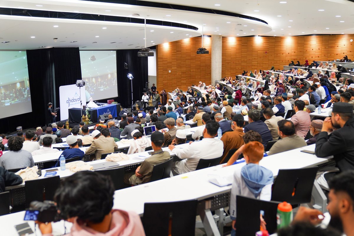 TahirulQadri's tweet photo. Day 2 | al-Hidayah 2026 | Canada

His Eminence Shaykh-ul-Islam Dr Muhammad Tahir-ul-Qadri Lectures on the Love of Allah and the Longing for the Divine Vision

Hamilton, Ontario (Canada): The second day of al-Hidayah Canada 2026, the first-ever three-day residential, spiritual and educational camp of its kind in North America at McMaster University, featured the second part of the three-day keynote lecture series by His Eminence Shaykh-ul-Islam Prof. Dr Muhammad Tahir-ul-Qadri. The session addressed the spiritual treatment of heedlessness ghafla (غفلة) through the love of Allah the Almighty and the longing for the vision of His Divine Countenance.

Continuing the lecture series "From Humanity to Depravity: A Moral and Spiritual Descent," Shaykh-ul-Islam explained that while the opening session had analysed the process of moral decline, beginning with ghaflah, the second session would present one remedy drawn from the complete prescription for its removal izālat al-ghafla (إزالة الغفلة). This is only achievable through kindling the love of Allah in one’s hearts and nurture the desire for the moment when the believers will behold His Delightful Countenance in the Hereafter. He noted that the third and concluding session would explore the psychological, neurological, Qur'anic and spiritual dimensions of ghaflah in detail, along with the complete methodology of its treatment.

The Supplication of the Beloved Prophet (ﷺ)

Shaykh-ul-Islam anchored the session in the supplication of the Holy Prophet (ﷺ), reported by Imam Aḥmad ibn Ḥanbal in his Musnad, Imam al-Nasāʾī in his Sunan, and Ibn Ḥibbān in his Ṣaḥīḥ:
"O Allah, I ask You for the delight of gazing upon Your Noble Countenance and for the longing to meet You." (As’aluka ladhdhata al-naẓari ilā wajhika wa al-shawqa ilā liqā’iqa (أسألك لذة النظر إلى وجهك والشوق إلى لقائك).

He described this as among the most beloved supplications to the Holy Prophet (ﷺ) and invited the audience to make it the direction and longing of their own lives.

The Promised Vision of the Divine Countenance

Drawing upon the agreed-upon hadith of Sayyidunā Jarīr ibn ʿAbd Allāh (R.A), Shaykh-ul-Islam explained the Prophetic promise: "Indeed, you will see your Lord just as you see this full moon, without difficulty in seeing Him." He elaborated that the wording ʿiyānan (عيانًا) in the narration of Imam al-Bukhārī conveys an actual and direct vision, free from doubt, speculation and mere imagination, a capacity Allah will grant to the eyes of the believers on the Day of Judgment.

He then presented the narration of Sayyidunā Jarīr ibn ʿAbd Allāh (RA), reported in Sunan Ibn Mājah: while the people of Paradise are immersed in their bliss, a light will shine upon them; they will raise their heads and behold their Lord, who will greet them with the words "Peace be upon you, O people of Paradise." The Holy Prophet (ﷺ) explained that this is the meaning of the Qur'anic verse "Peace!—a word from a Most Merciful Lord." (Qur'an 36:58) So long as they gaze upon Him, they will pay no attention to any other delight of Paradise; and when the veil returns, His light and blessing will remain upon them and their dwellings.

Citing the narration of Sayyidunā ʿAlī (AS), recorded by Imām al-Mundhirī in al-Targhīb wa al-Tarhīb and gathered by ʿAllāmah Ibn al-Qayyim in Rawḍat al-Muḥibbīn, he described how Almighty Allah will send the Trustworthy Spirit to the people of Paradise with the announcement: "O people of Paradise, your Lord sends you His greeting of peace and commands you to visit Him in the open court of Paradise." The people of Paradise will come forth radiant with glad tidings, and there the supreme honour will be bestowed upon them: the vision of His Most Generous Countenance.

In further narrations on the subject recorded by Imam al-Mundhirī and gathered by ʿAllāmah Ibn al-Qayyim, Shaykh-ul-Islam related that upon beholding the Countenance of the Lord of all the worlds, the people of Paradise will be overwhelmed by the majesty of that encounter and exclaim, "Subḥānaka! Mā ʿabadnāka ḥaqqa ʿibādatik." ("Glory be to You! We have not worshipped You as You deserve to be worshipped."). Allah the Almighty will reply, "By My grace, I have granted you the vision of My Countenance and admitted you into My Abode."

Practical Preparation for the Meeting with Allah

Shaykh-ul-Islam stressed that longing for the Divine Vision demands more than wishes and emotions; it requires practical obedience. He outlined a programme of preparation: guarding the obligatory prayers, declaring "I can die, but I cannot miss a ṣalāh," for prayer is the believer's rehearsal for standing before Allah; sincere and daily repentance, for in the eyes of the lovers no sin is minor; lowering the gaze and purifying the eyes; abandoning unlawful deeds, relationships and income; cleansing the heart of jealousy, arrogance and malice; constant remembrance of Allah; and serving the entirety of Allah's creation, in the light of the hadith, "All creation is the family of Allah, and the most beloved to Him is the one most beneficial to His family."
He explained that the true believer lives between hope and fear al-khawf wa al-rajāʾ (الخوف والرجاء): hope inspires love, longing and passion for meeting with Allah, while fear protects the believer from heedlessness, arrogance and persistence in disobedience.

The Door of Prostration

In the concluding portion of the lecture, Shaykh-ul-Islam expounded the secret of sujūd (السجود): the body descends into its lowest physical position while the soul rises to its highest station. Ablution purifies the body, he explained, while prostration purifies the heart, removing pride, heedlessness and distance from Allah. He urged the youth to teach their foreheads to recognise the prayer mat, to fill their youth with prostration before age and weakness overtake the body, and to rise in the darkness of the night, for this world is the abode of deeds and the Hereafter the abode of reward: Paradise is the harvest, and this life the field in which it must be planted.
Recalling the weeping of Yazid al-Raqqashi at the approach of death, who said, "I weep for the night prayers I shall no longer be able to offer," he delivered his parting message to the attendees: "Who will pray for you when the time is gone? Do not be deceived by your youth. Change your life, change your priorities, and live to know Allah, to love Allah, and to please Allah. This is the supreme success."

Shaykh-ul-Islam repeatedly invited the attendees to commit to a life of preparation for the meeting with their Lord, and the session concluded amid expressions of devotion from the participants.
Accompanying His Eminence Shaykh-ul-Islam were Prof Dr Hassan Mohiuddin Qadri (Chairman Supreme Council, MQI), Shaykh Hammad Mustafa al-Madani al-Qadri, Shaykh Ahmad Mustafa al-Arabi al-Qadri, Dr Faisal Iqbal Khan, Syed Shahzad Ali Faizi, Syed Saad Ali Faizi, Syed Soban Ali Faizi, Dr Ghazala Qadri (President of Minhaj-ul-Quran Women League International), and Baji Khadija Qurat-ul-Ain Qadri, each exemplifying leadership in the pursuit of authentic, scholarly Islam.

The event also saw the presence of distinguished guests Peter Fonseca, MP Ontario, Canada; Shaykh Yasser Ahmed Albaz; Shaykh Waleed Almakee, founder of Noon Academy; Shaykh Nisar Sulaimani; Shaykh Abdulaziz from Dar Foundation, along with other participants from North America.

#AlHidayah2026 #MinhajulQuran #ShaykhulIslam #DrTahirulQadri #SpiritualJourney #LoveOfAllah #Hamilton #Canada #McMasterUniversity