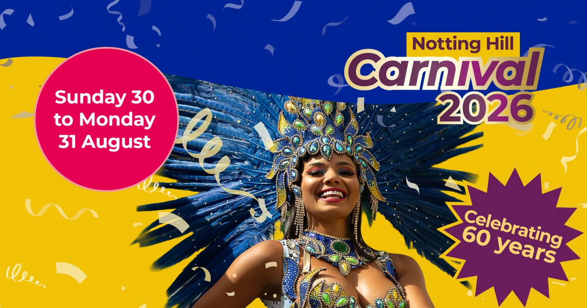 A smiling carnival performer in an elaborate blue feathered headdress, promoting the Notting Hill Carnival 2026.