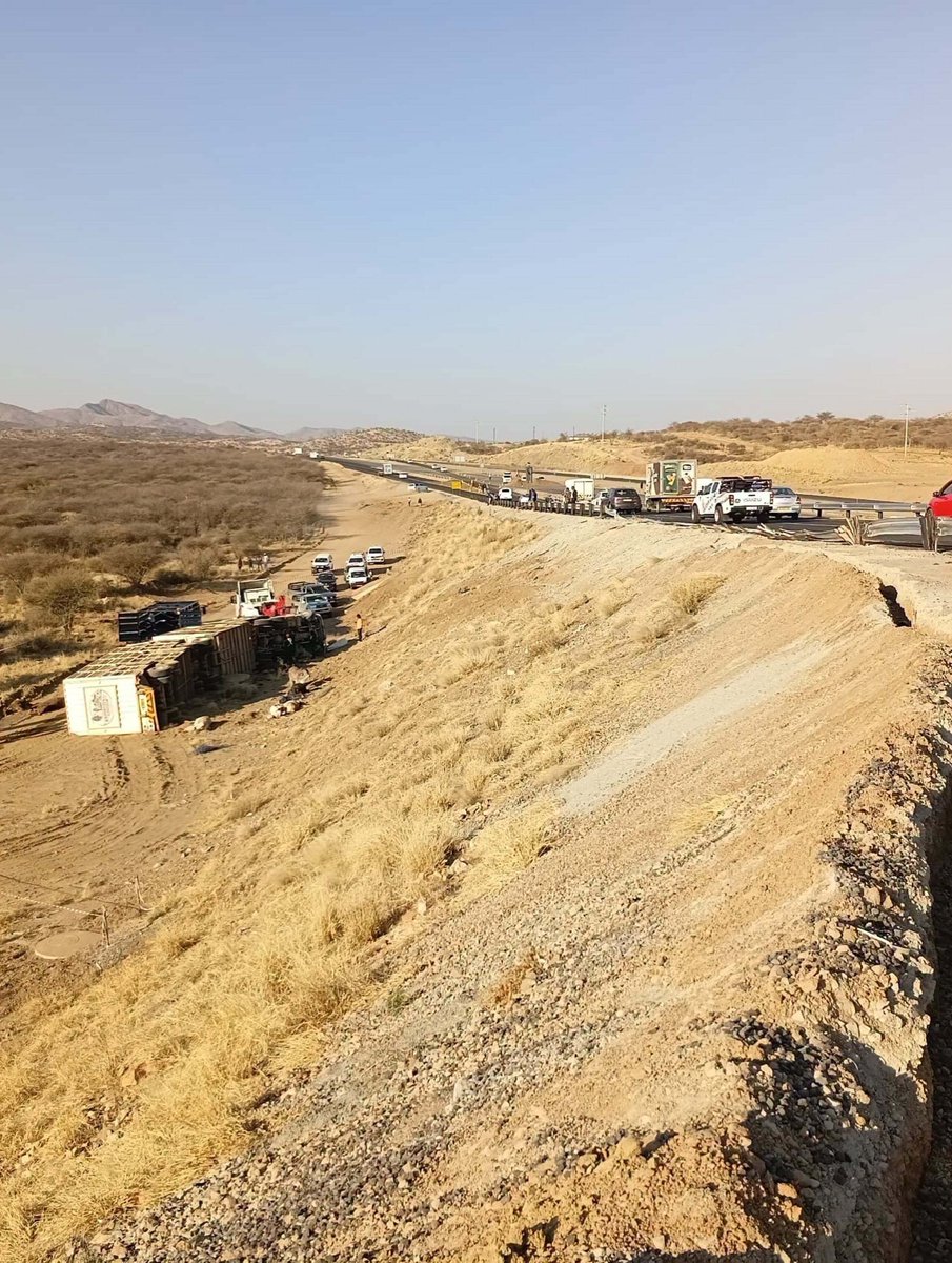 TheNamibian's tweet photo. TRAGEDY … One person died and two others were injured when two trucks were involved in accidents minutes apart on the Western Bypass early on Monday. One of the trucks was transporting cattle, which had to be euthanised on the scene due to the extent of their injuries. photo: George Hendricks/NampaTV