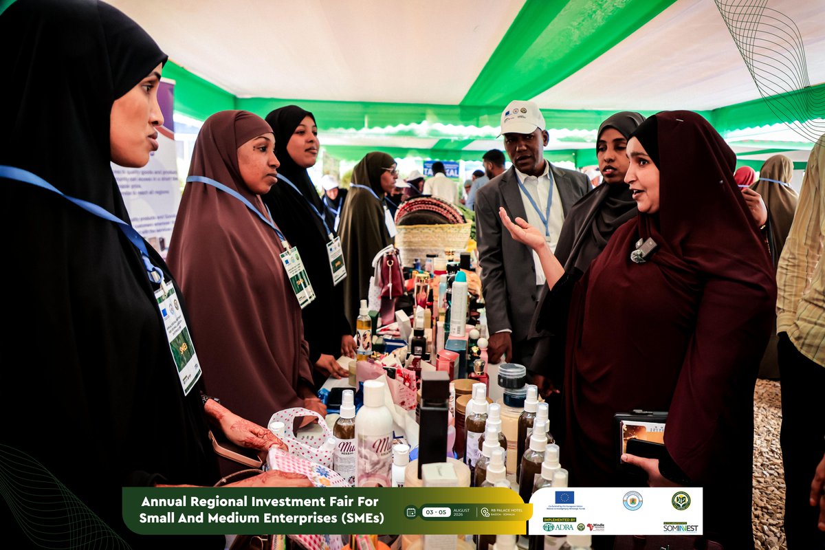reado_org's tweet photo. Ministers, government officials, CSO leaders and other guests walked through the exhibition area at the Annual Regional Investment Fair this morning — meeting the women entrepreneurs behind each stall, hearing the story of every business, and doing what matters most: buying, promoting and sharing what they saw.  Because when the room's most senior visitors leave with something in hand, the endorsement carries beyond words.  
📅 3–5 August 2026 📍 Baidoa  Investing in Women. Growing Southwest Somalia.  
Implemented by @adra_somali, READO and @WindleKe_Som, in collaboration with @Invest_Somalia and @SomaliaMolsa Southwest State, co-funded by @EU_in_Somalia.  #eWINS #InvestingInWomen #WomenEntrepreneurs #SMEs #Baidoa #SouthwestSomalia #Somalia #EUinSomalia