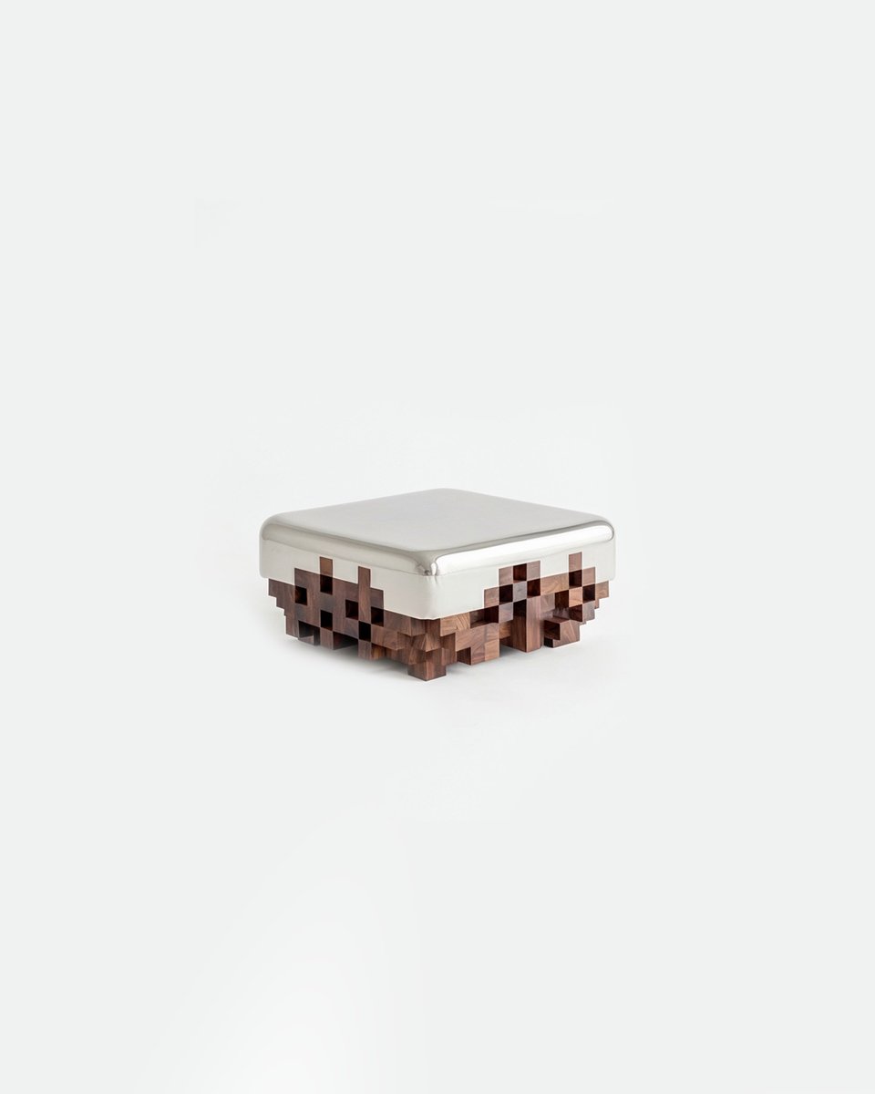 HYPEBEAST's tweet photo. Minecraft, but make it IRL 🟫 

The Ghost Collection merges aluminum forms into pixelated wood. A design collaboration by Alberto Essesi and Ceren Arslan of PIXEL THEORY. https://t.co/dHya5lXxx7