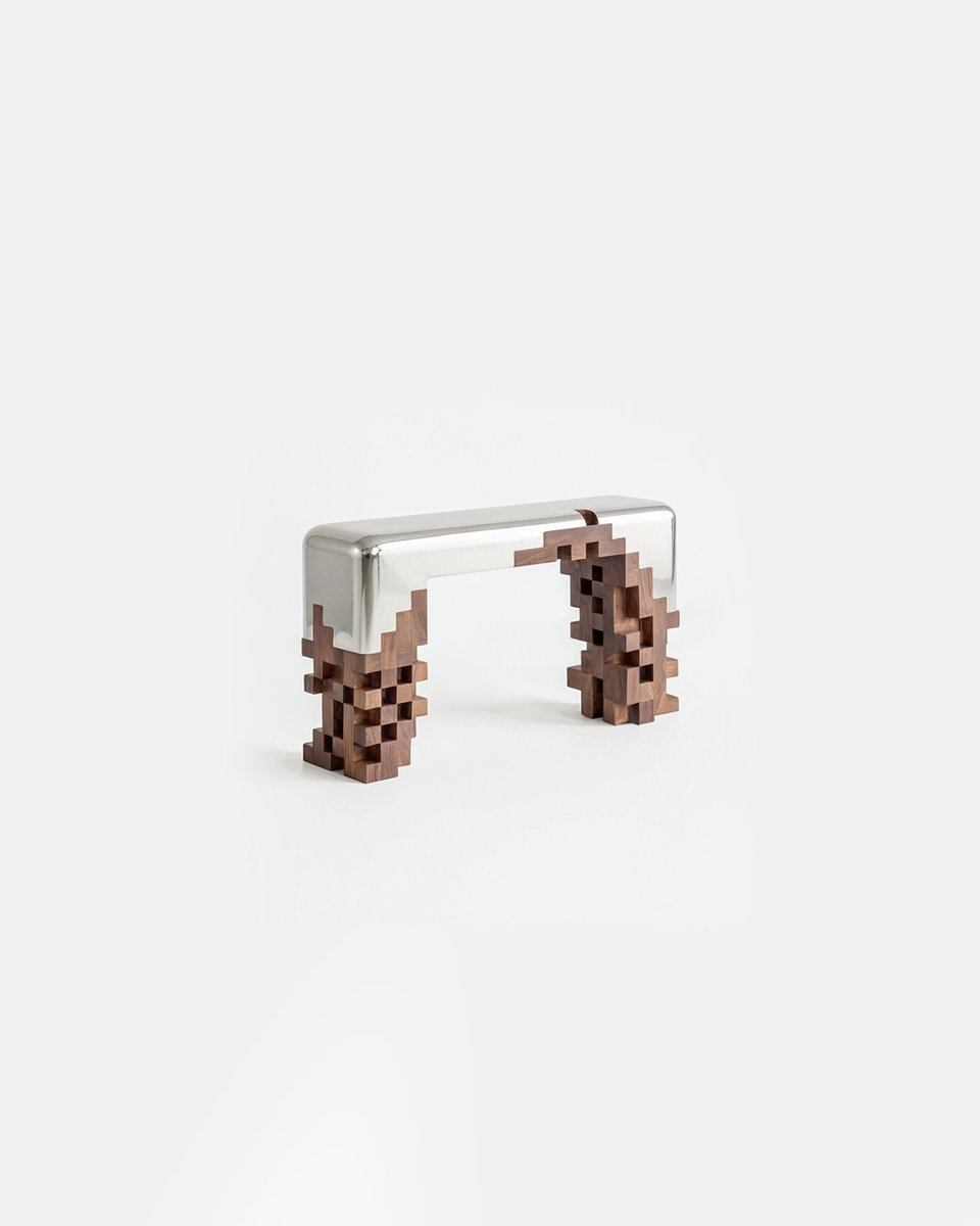 HYPEBEAST's tweet photo. Minecraft, but make it IRL 🟫 

The Ghost Collection merges aluminum forms into pixelated wood. A design collaboration by Alberto Essesi and Ceren Arslan of PIXEL THEORY. https://t.co/dHya5lXxx7
