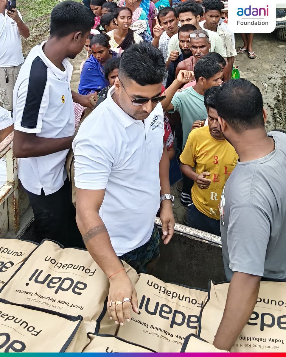 AdaniFoundation's tweet photo. During times of crisis, the Adani Foundation stands by communities with care and commitment. In flood-hit Assam, we’re reaching families across 14 villages in Sivasagar and Dhemaji with essential relief kits, supporting their recovery with strength, dignity and resilience. https://t.co/1K0gGCGO3R