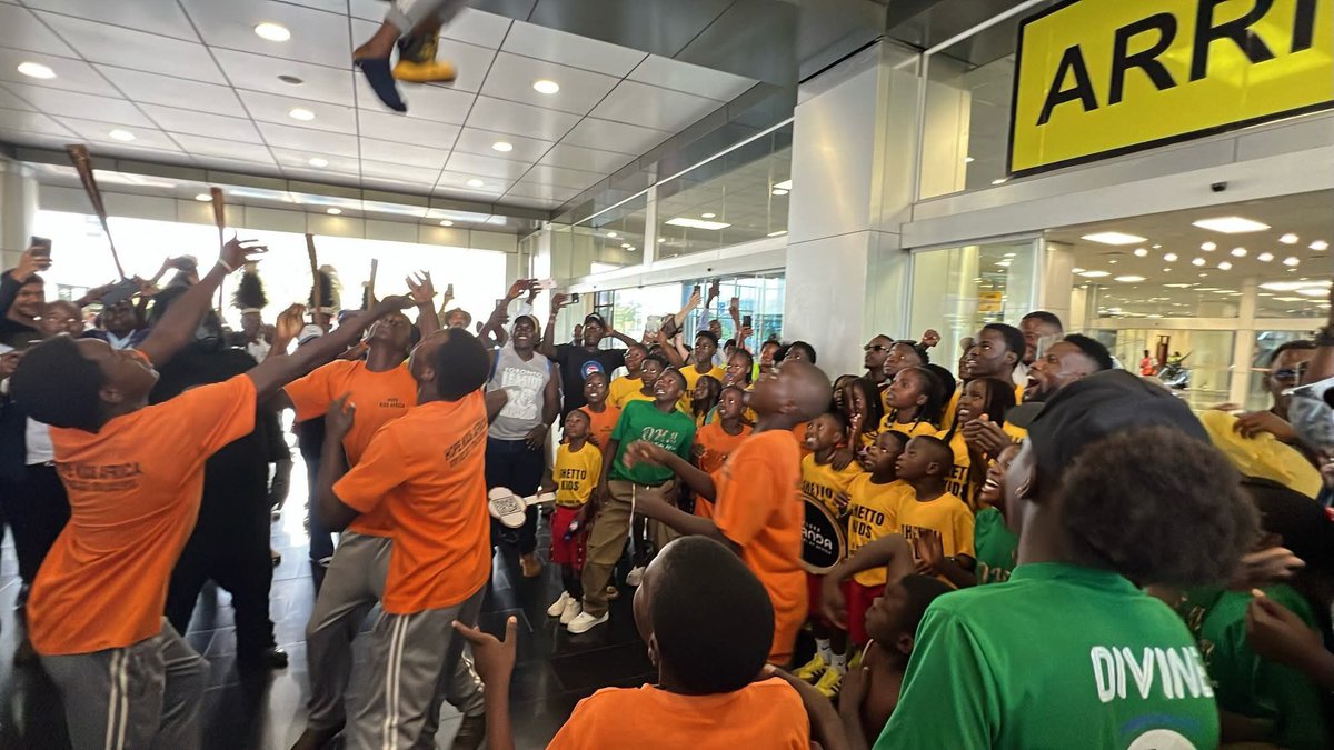 MBU's tweet photo. .@ghettokidstfug have a warm welcome back home after showcasing Uganda's talent at the 2026 FIFA World Cup halftime show 🇺🇬👏🏾 https://t.co/wp50NsP6Ra